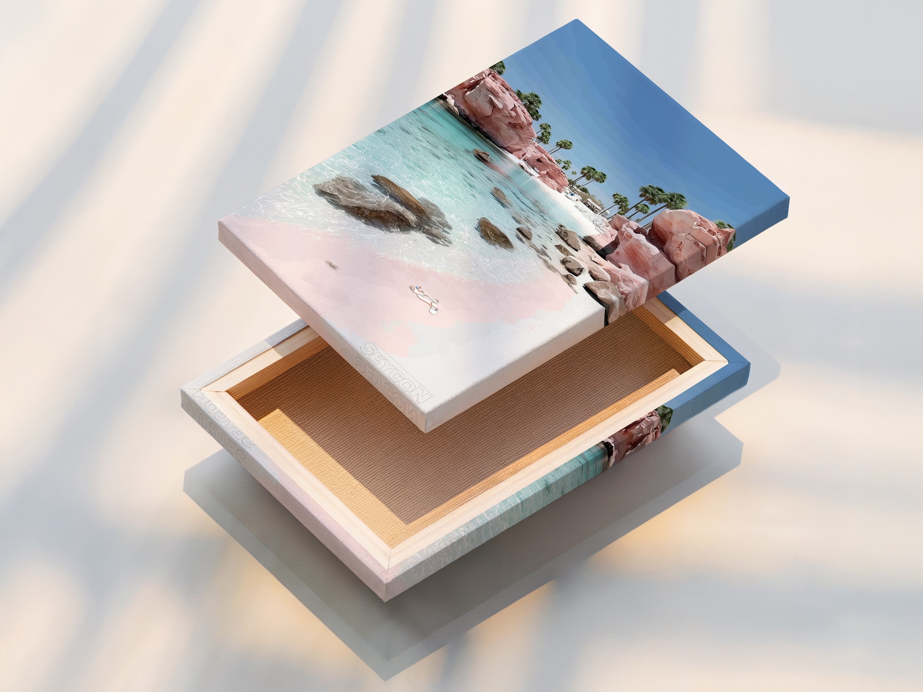 A stretched canvas print of a Pink Sand Beach is displayed. This artwork brings coastal charm to any room. The stretched canvas enhances the texture and colors of the turquoise ocean and pink sands.
