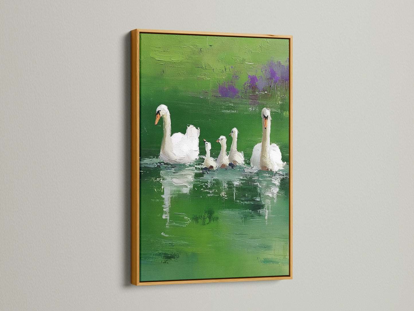 Artwork is elegantly displayed in a gold frame. The artwork features swans in a pond setting. The gold frame adds a touch of luxury. It enhances the artwork's beauty. Perfect for adding a hint of glamour to your decor.