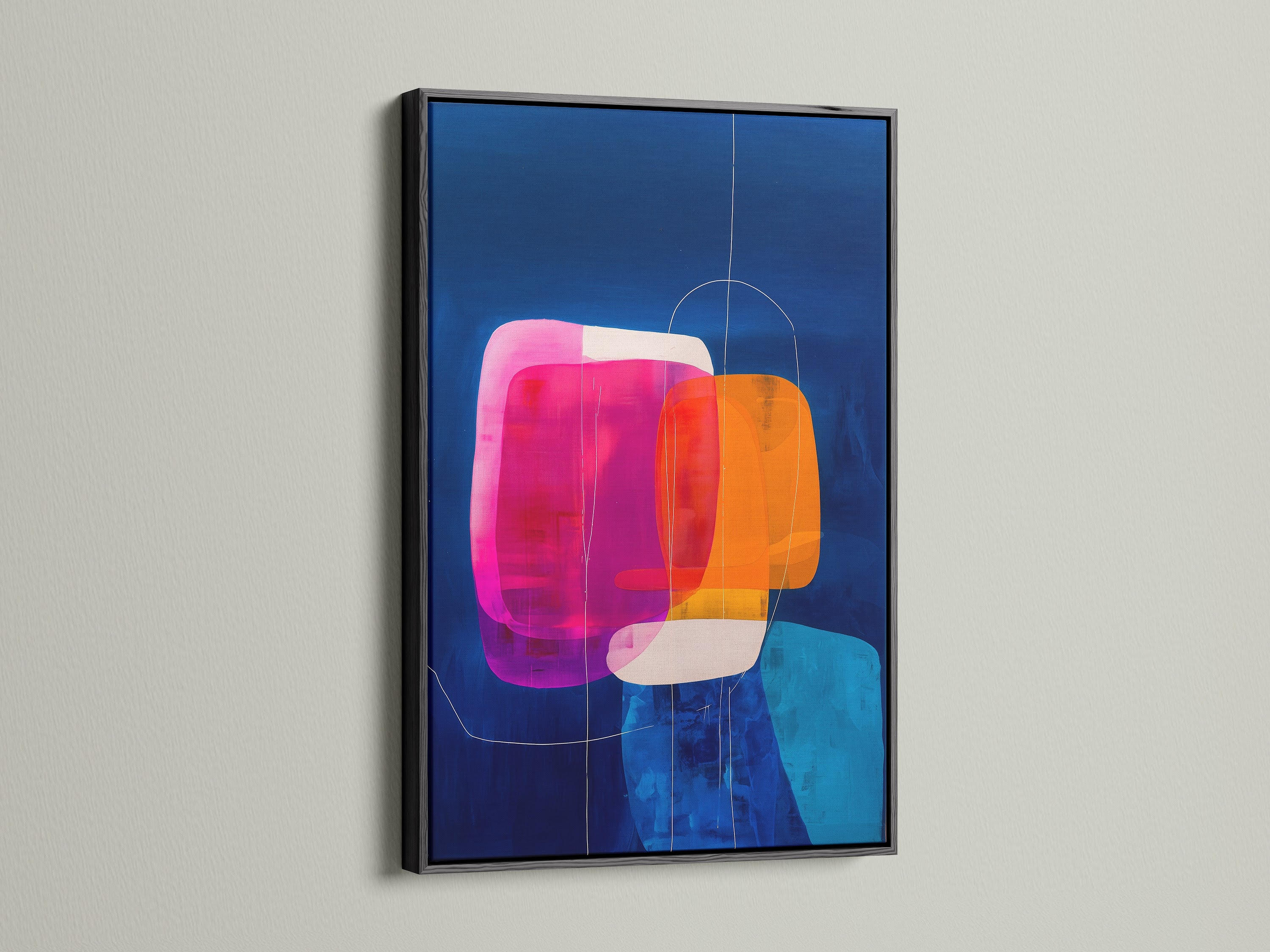 Eye-catching abstract geometric artwork is framed in black. The contemporary print includes blue orange and pink elements. It is mounted on a clean white wall. A stylish piece for any modern interior space. Perfect for a studio or lobby