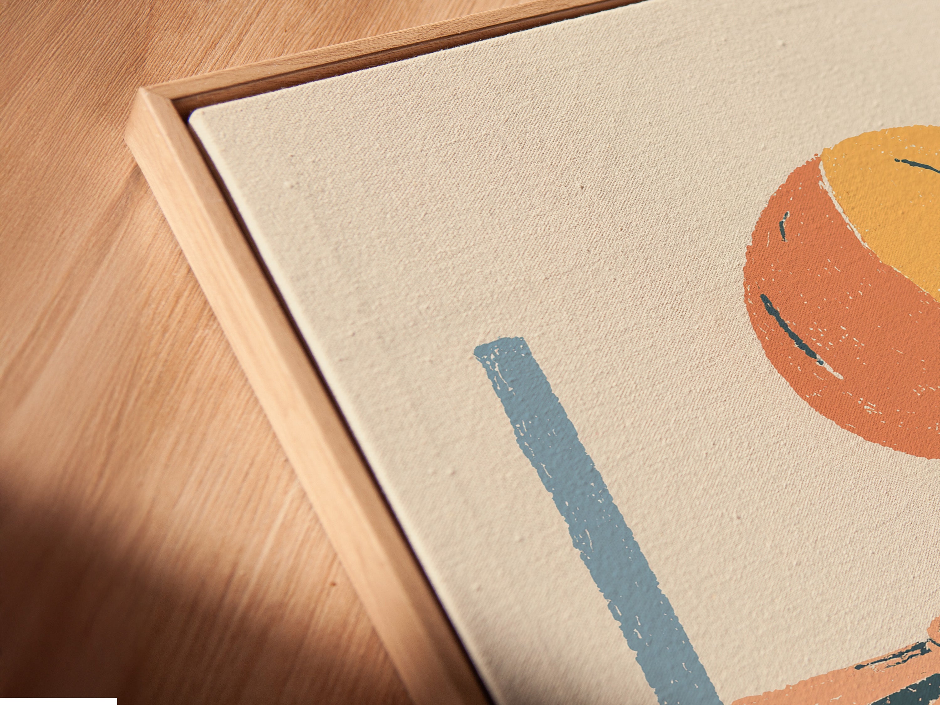 A close-up shot shows a canvas print in a floating frame. The frame gives the illusion that the artwork is floating. It adds depth and dimension to the piece. This framing style is modern and elegant.