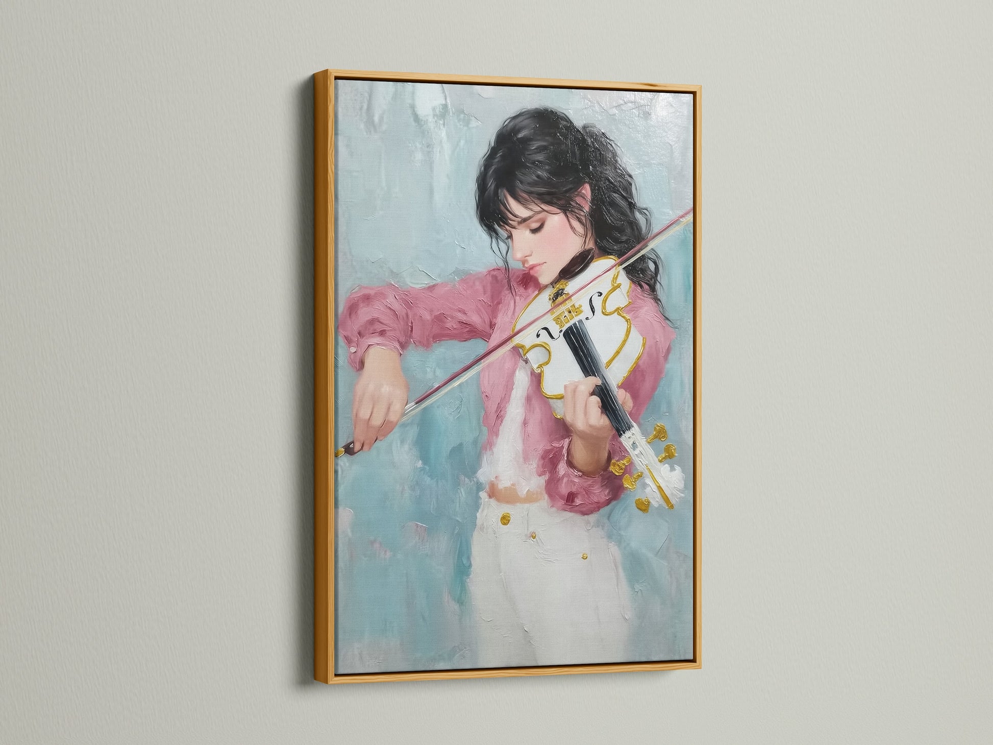 The gold frame adds a touch of elegance to the violinist artwork. The canvas print features a girl playing a violin. The pink and teal artwork brings life to any space. The artwork is ideal for music rooms and studios. Surprise a musician with this thoughtful gift.