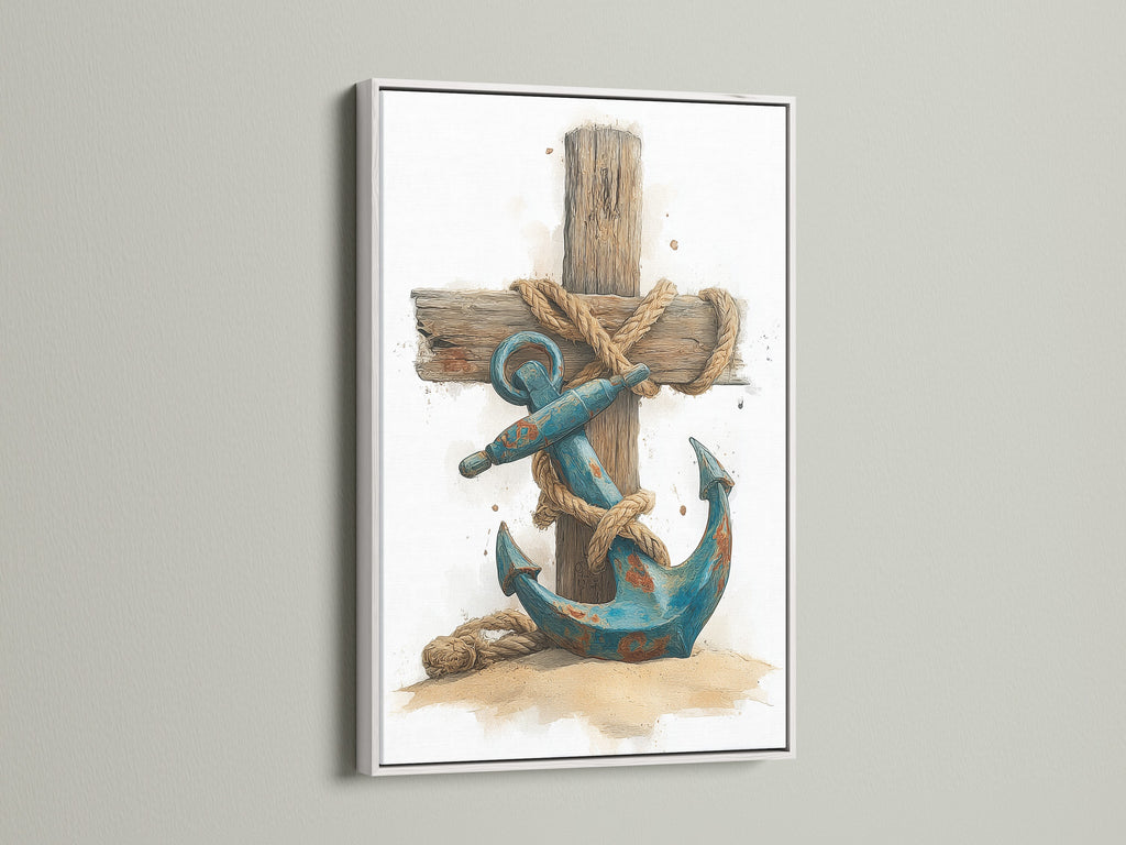 A framed art print with a white frame. The artwork depicts a blue anchor. It is wrapped in rope against a wooden cross. The white frame offers a clean and modern look. It makes the artwork pop. This is perfect for any room.
