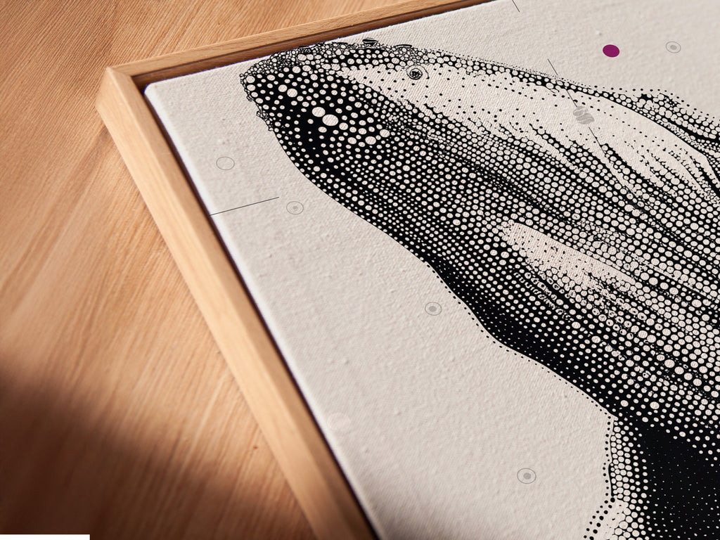 Close-up of a Humpback Whale canvas print in a floating frame. Angled view showcasing the detail and texture. This marine animal print adds depth to your walls. Ideal for a modern coastal theme. The black and white dotted whale art is a great choice.