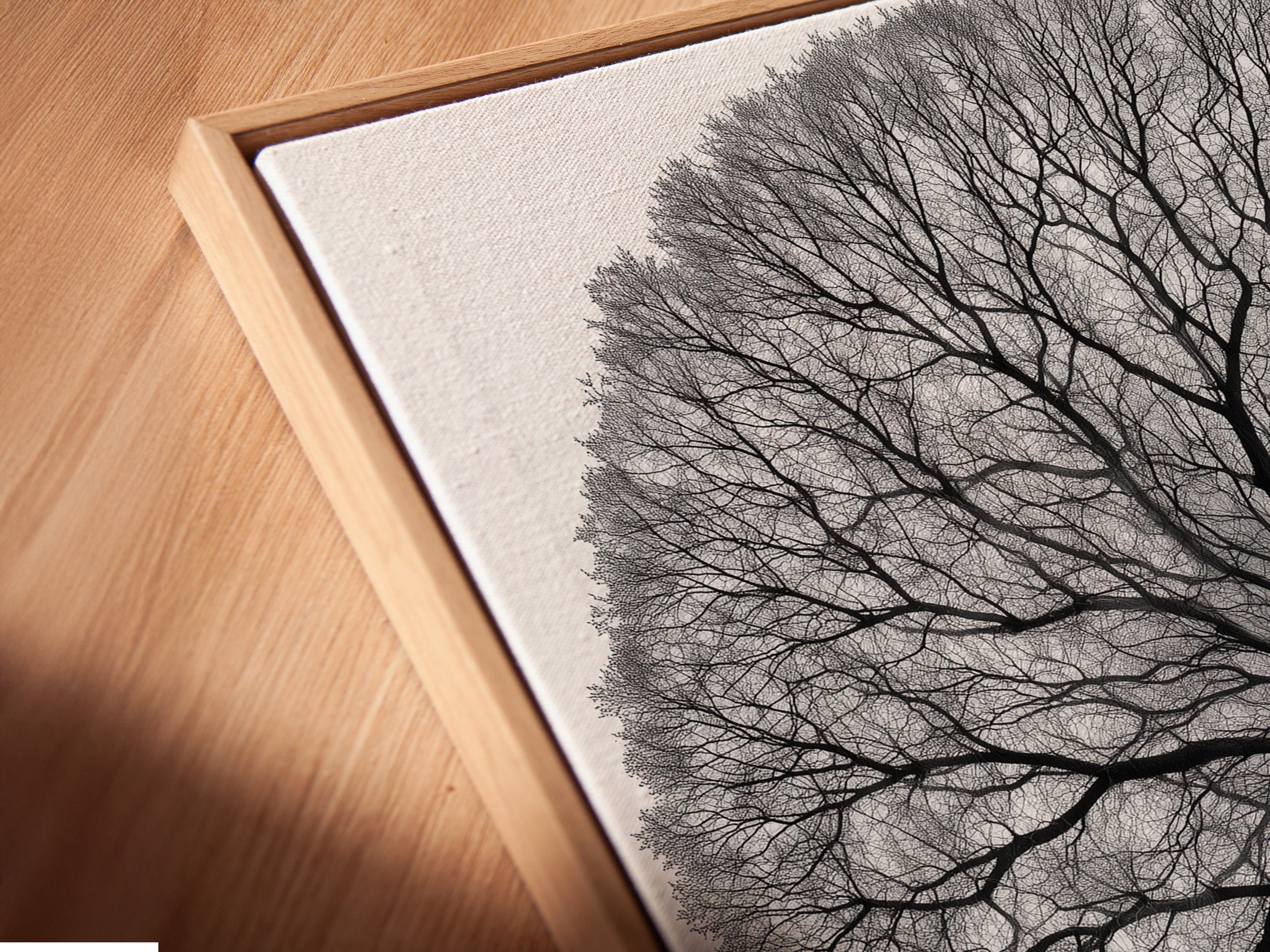 A close-up of the Tree of Life canvas print in a floating frame. This enhances the artwork's contemporary style. Perfect for adding a spiritual touch to any room. The frame adds depth and sophistication to the print.