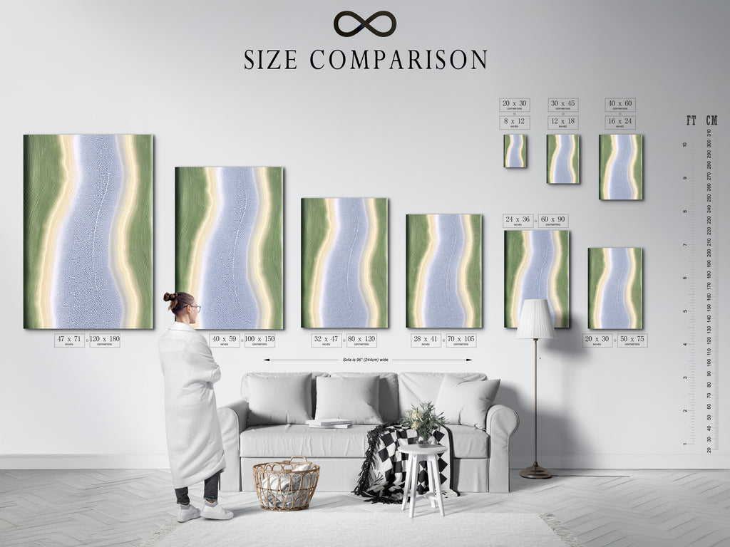 Size comparison chart in an interior setting. The chart helps visualize the artwork's dimensions. The abstract river artwork is available in various sizes. Find the perfect fit for your wall decor needs.