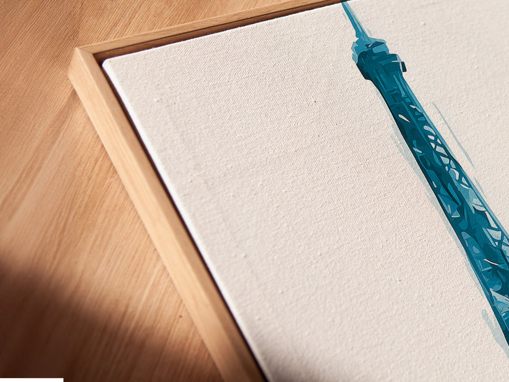 Angled close-up reveals a canvas print in a floating frame. The artwork is an Eiffel Tower canvas print. The Parisian woman with umbrella wall art adds depth. Perfect for modern and sophisticated spaces. Shop now for office wall decor. Discover French artwork and Parisian decor options for your space.