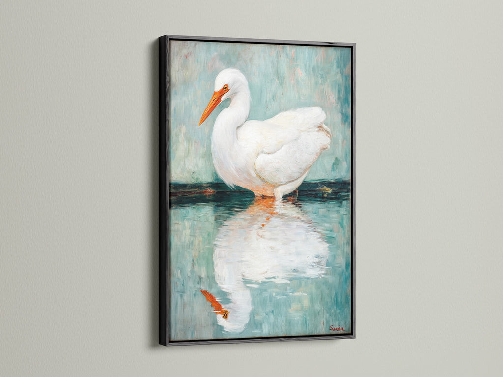 The Egret art features a sleek black frame. This bird canvas print adds sophistication to modern spaces. The coastal wall art contrasts beautifully against light walls. Ideal for a minimalist aesthetic.  This heron print brings a touch of nature indoors. This avian art is perfect for your living room wall decor or bathroom art.