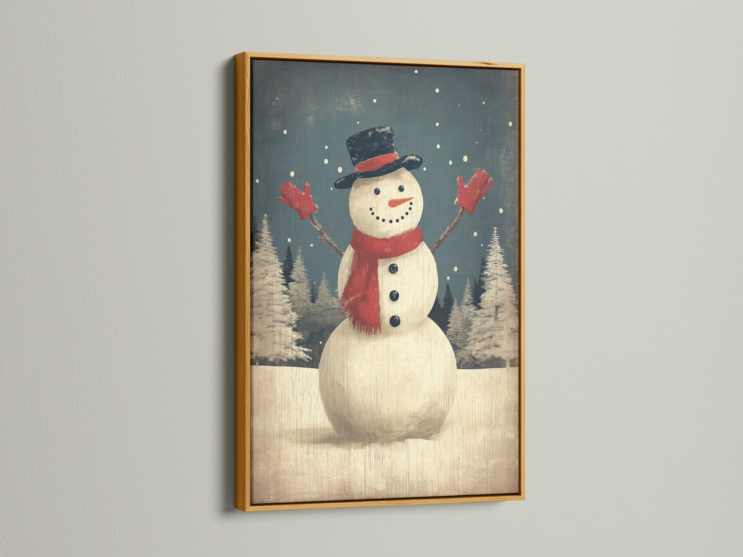 A radiant snowman winter art print is highlighted by a gold frame. This holiday home decor radiates festive warmth. The artwork brings a luxurious touch to christmas canvas art and farmhouse christmas themes.