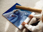 This photo shows a woman carefully rolling a fine art poster paper. The paper features a beautiful octopus art print. This highlights the care and quality of our art prints. Fine art paper ensures vibrant colors and lasting beauty. Perfect for collectors and art enthusiasts.