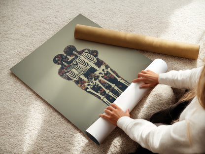 A woman rolls a fine art poster paper with the Floral Skeleton artwork. This gothic wall art is perfect for any space. It is suitable for dark academia decor. Get your own bone print today.