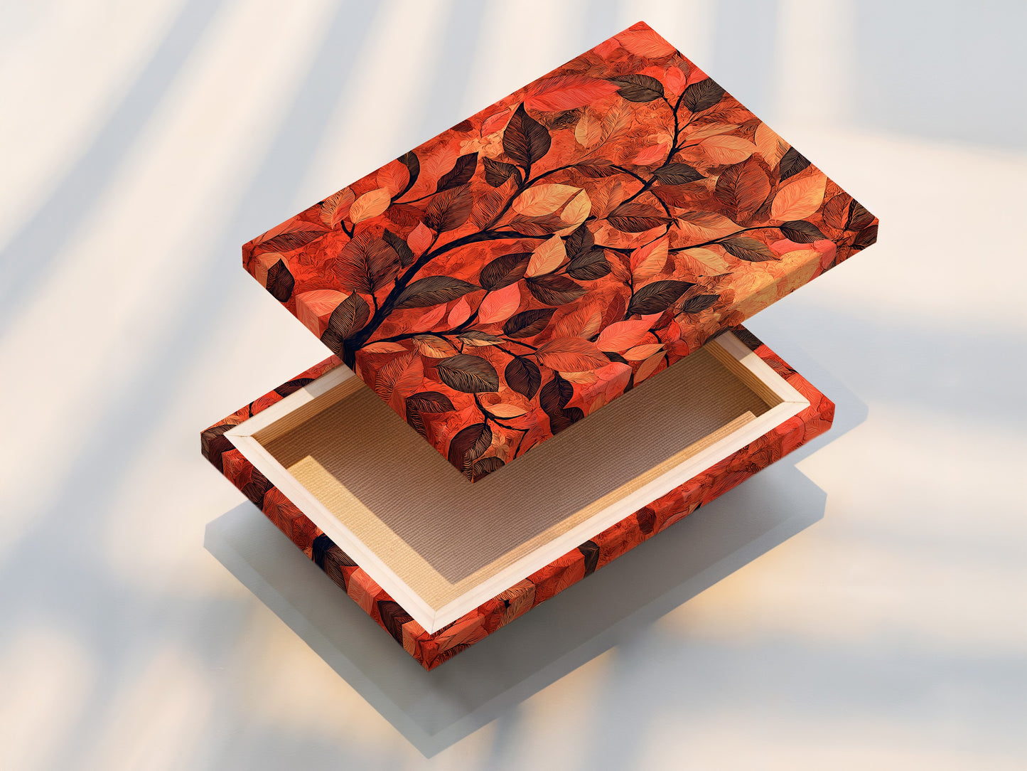 This is a stretched canvas print of botanical leaf art. The terracotta wall art is ready to hang. The autumn leaves artwork is stretched perfectly. It's ideal for adding a touch of nature to any room. The stretched canvas enhances the foliage print. It offers a gallery-ready look.