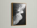 This is a black and white ocean wave artwork print. It is presented in a gold frame. This exquisite piece is perfect for adding a touch of elegance. It is minimalist decor. The beach canvas print enhances any space. Ideal for those seeking refined coastal wall art. Perfect for living rooms bedrooms and offices.