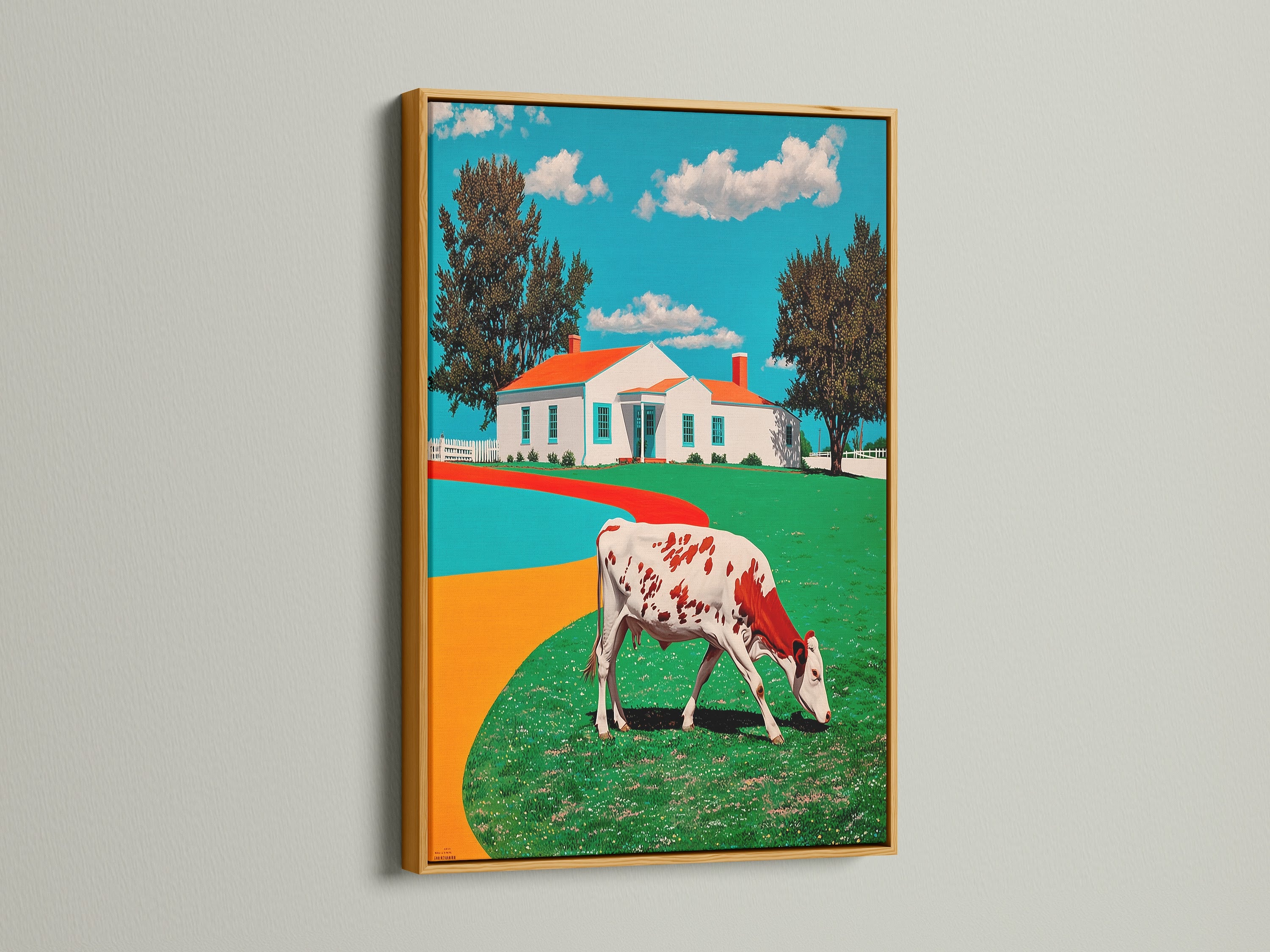 Cow Canvas Print in a Gold Frame. This art features a red and white cow grazing near a farmhouse. The gold frame adds elegance to the countryside print. Ideal for farmhouse wall art or quirky kitchen art. This rustic animal artwork brings a vintage style. Perfect for cottagecore-themed homes. Discover the charm of this framed art.