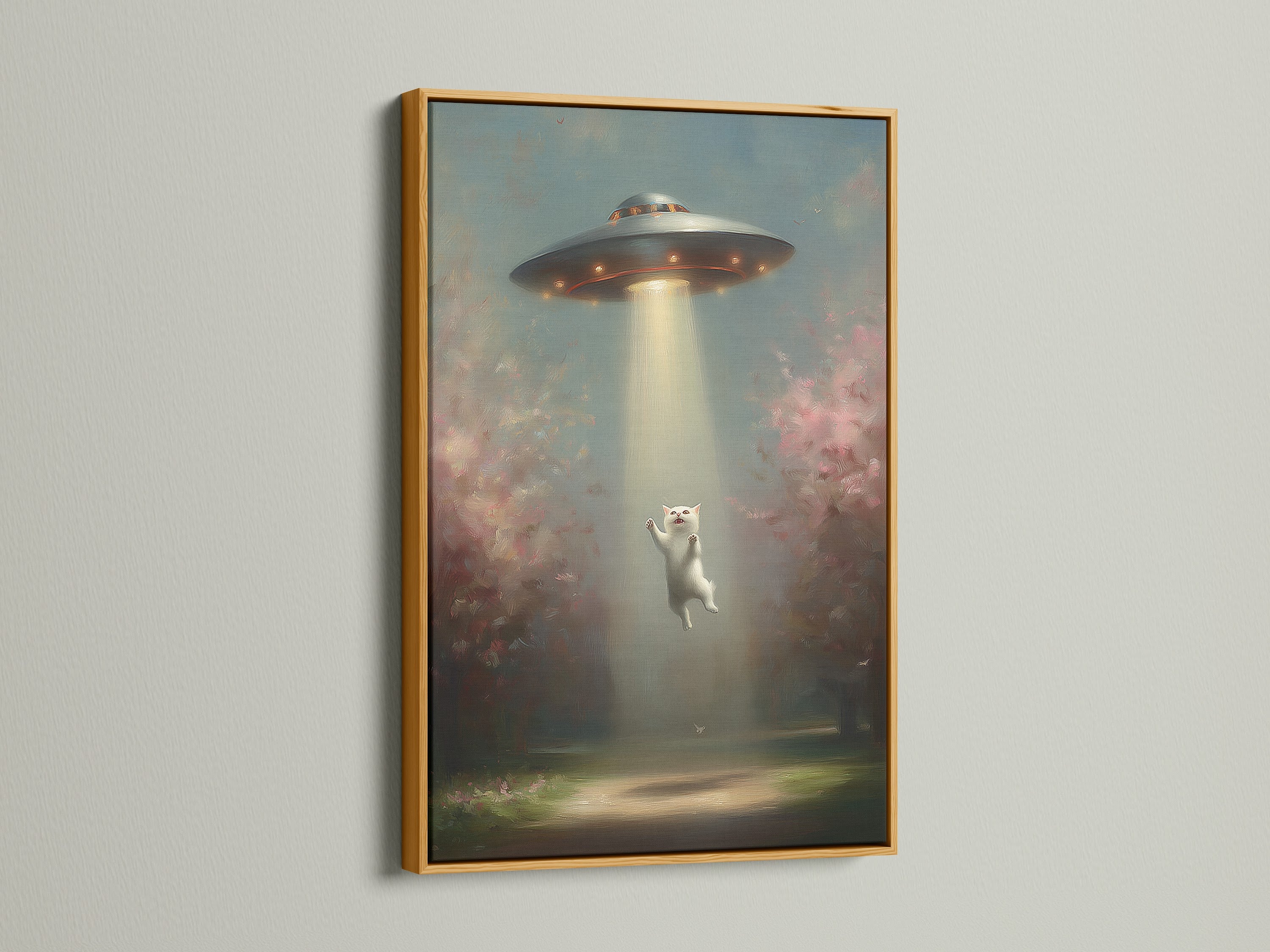 A gold frame surrounds the UFO Cat art print. The gold frame complements the pink and green tones. This space art print brings cosmic charm to your home or office.