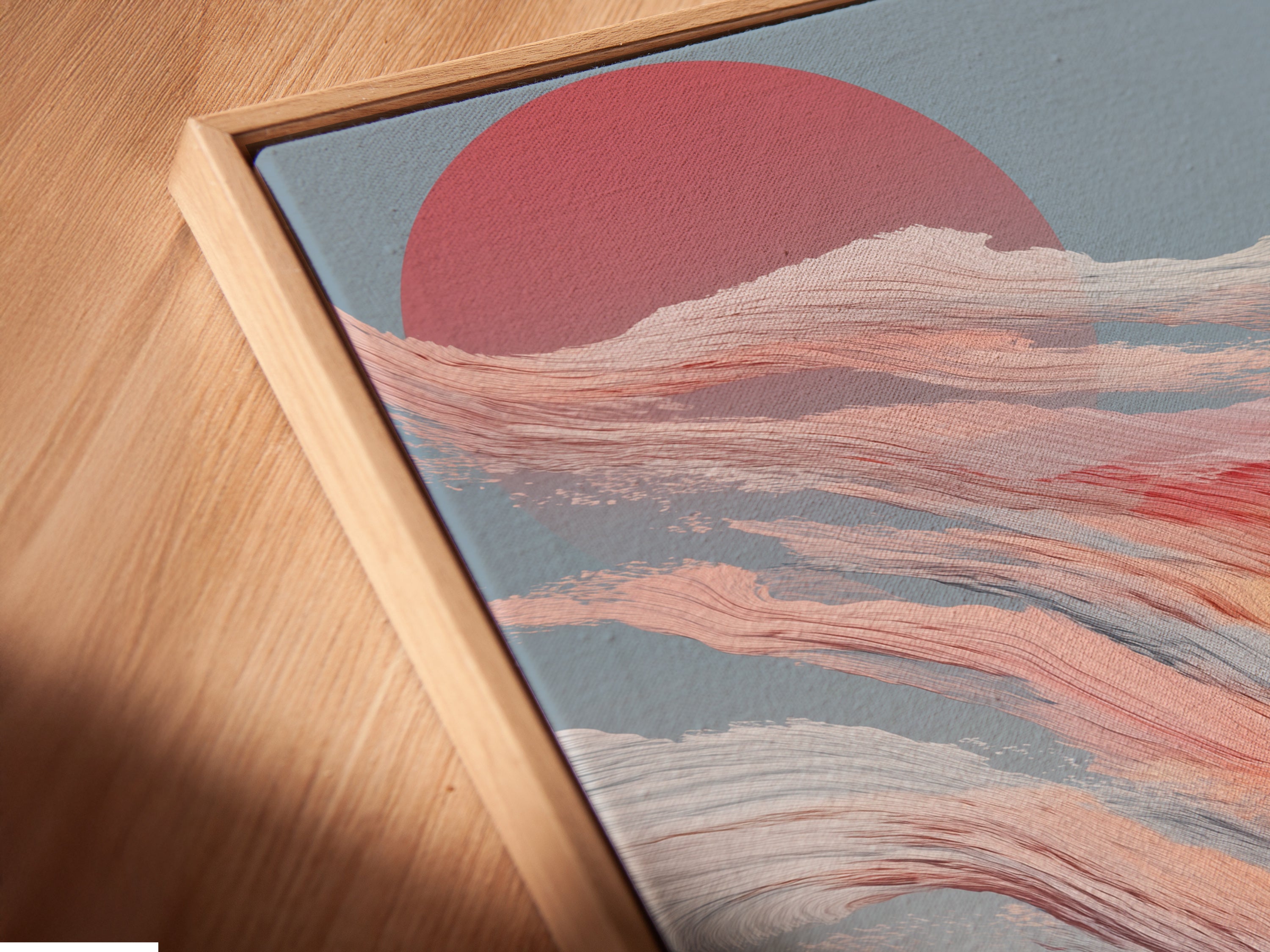 A close-up of a canvas print in a floating frame. The artwork shows a cowboy at sunset. The floating frame enhances the artwork's visual appeal. Perfect for adding a touch of southwest charm to your home.