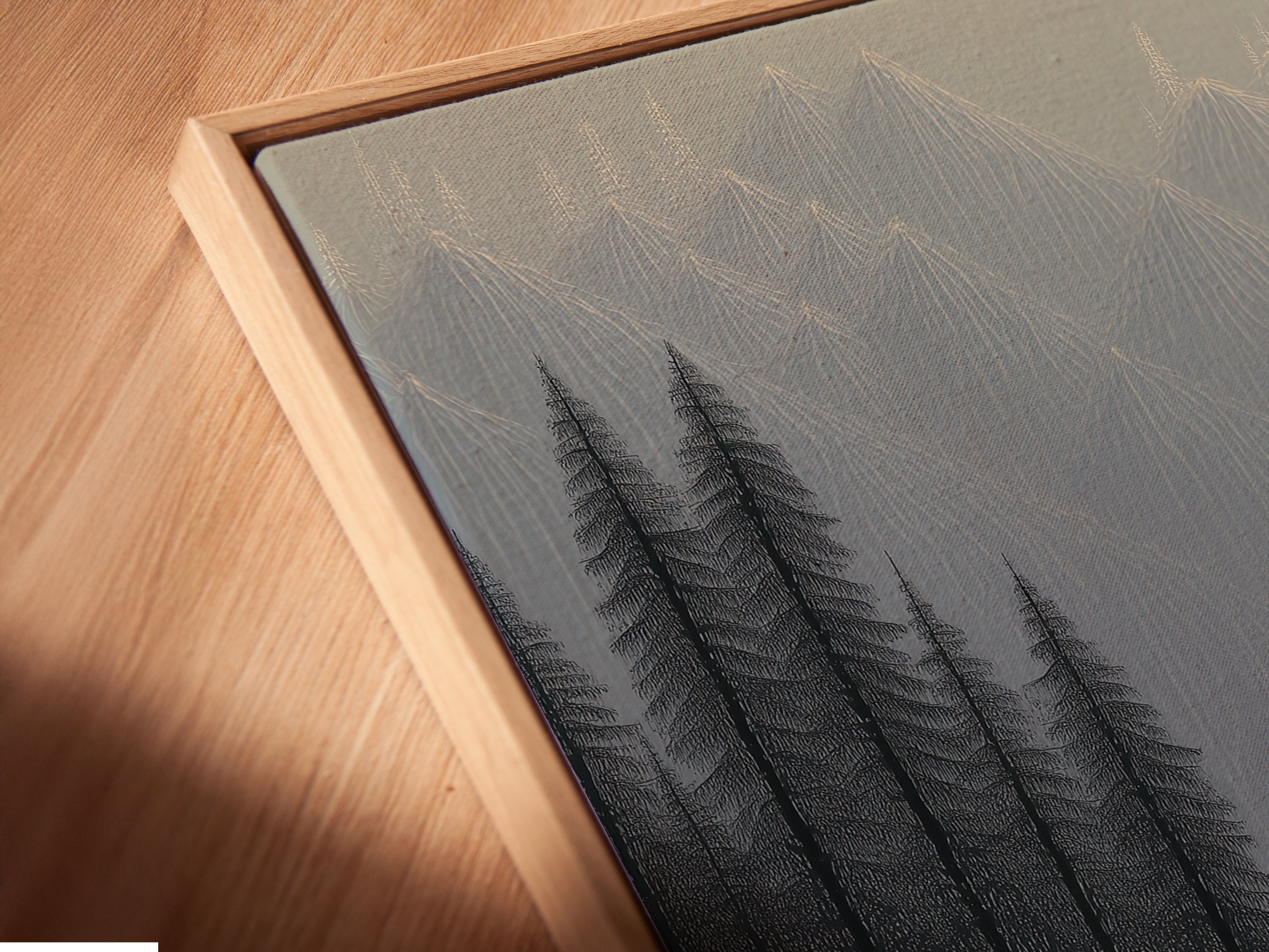 A close-up angled view of the Whale Sunset canvas print in a floating frame. The frame enhances the minimalist art. Perfect for adding a touch of nature to your space. This ocean canvas creates a calming atmosphere in any room.