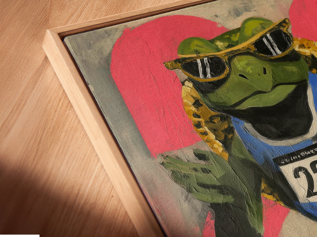 Angled close up of a canvas print in a floating frame. The frog runner artwork features graffiti style art. It adds an urban touch to any space. Ideal for teen room decor or fitness motivation. This retro sports art is perfect for boutique art studios lobbies and sports-themed rooms.