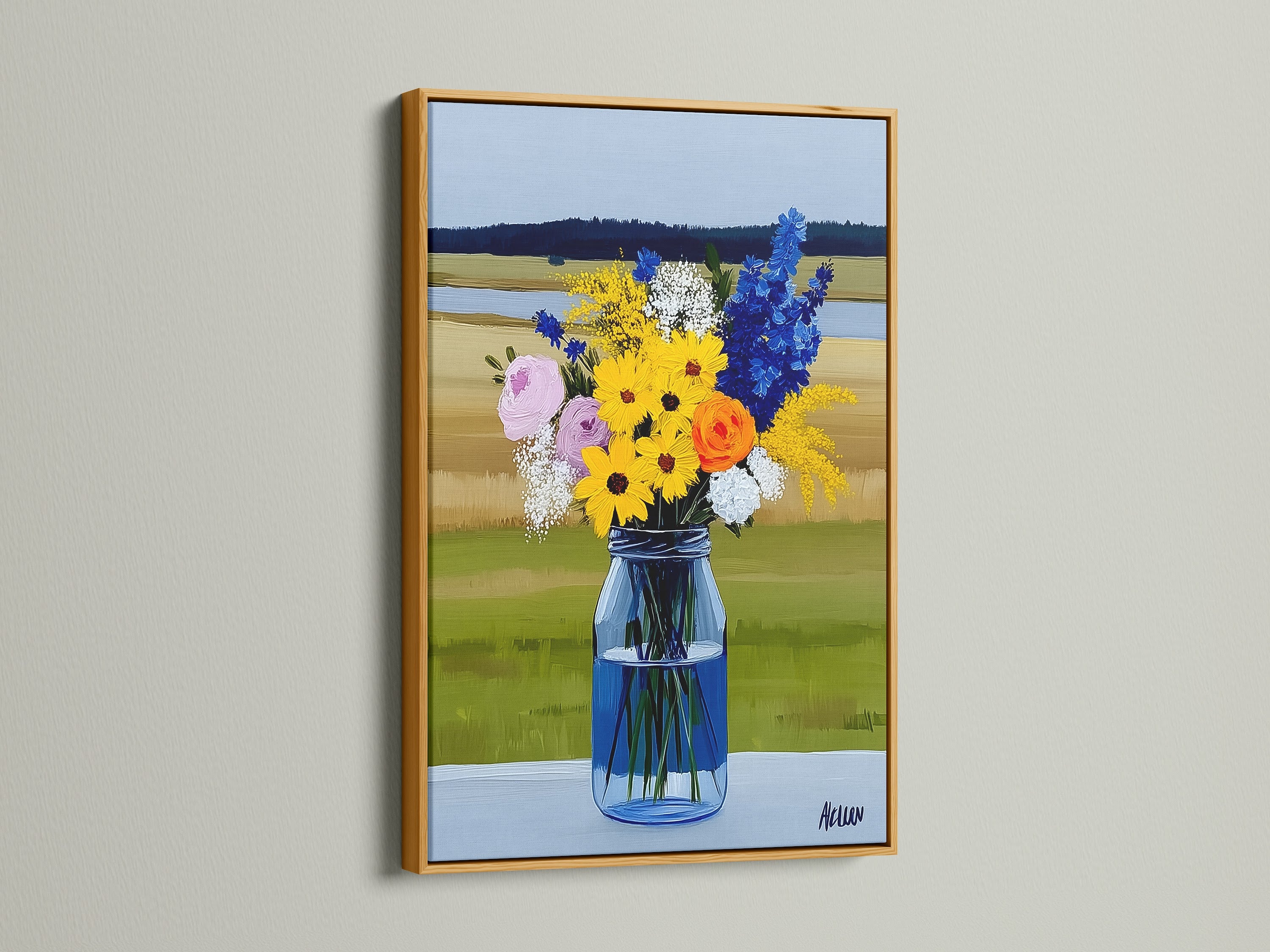 A wildflower bouquet artwork is displayed in a gold frame. The art features colorful wildflowers in a blue vase. This flower artwork adds elegance and warmth to any space. A great addition to your wall art collection.