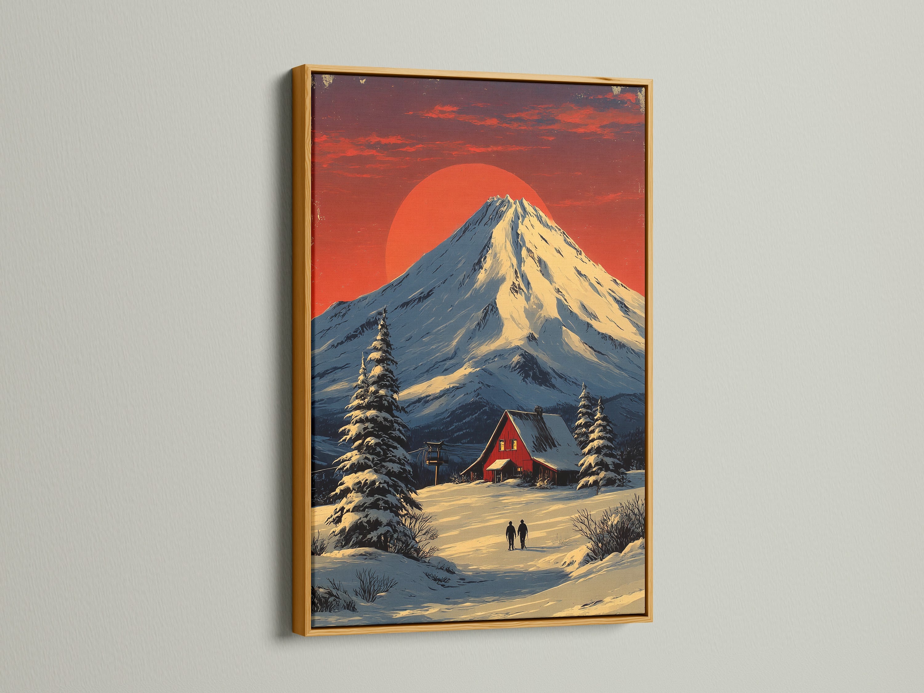 Winter mountain landscape artwork with a snowy cabin wall art is displayed in a gold frame. Perfect rustic home decor. The primary color is red and secondary color is white.