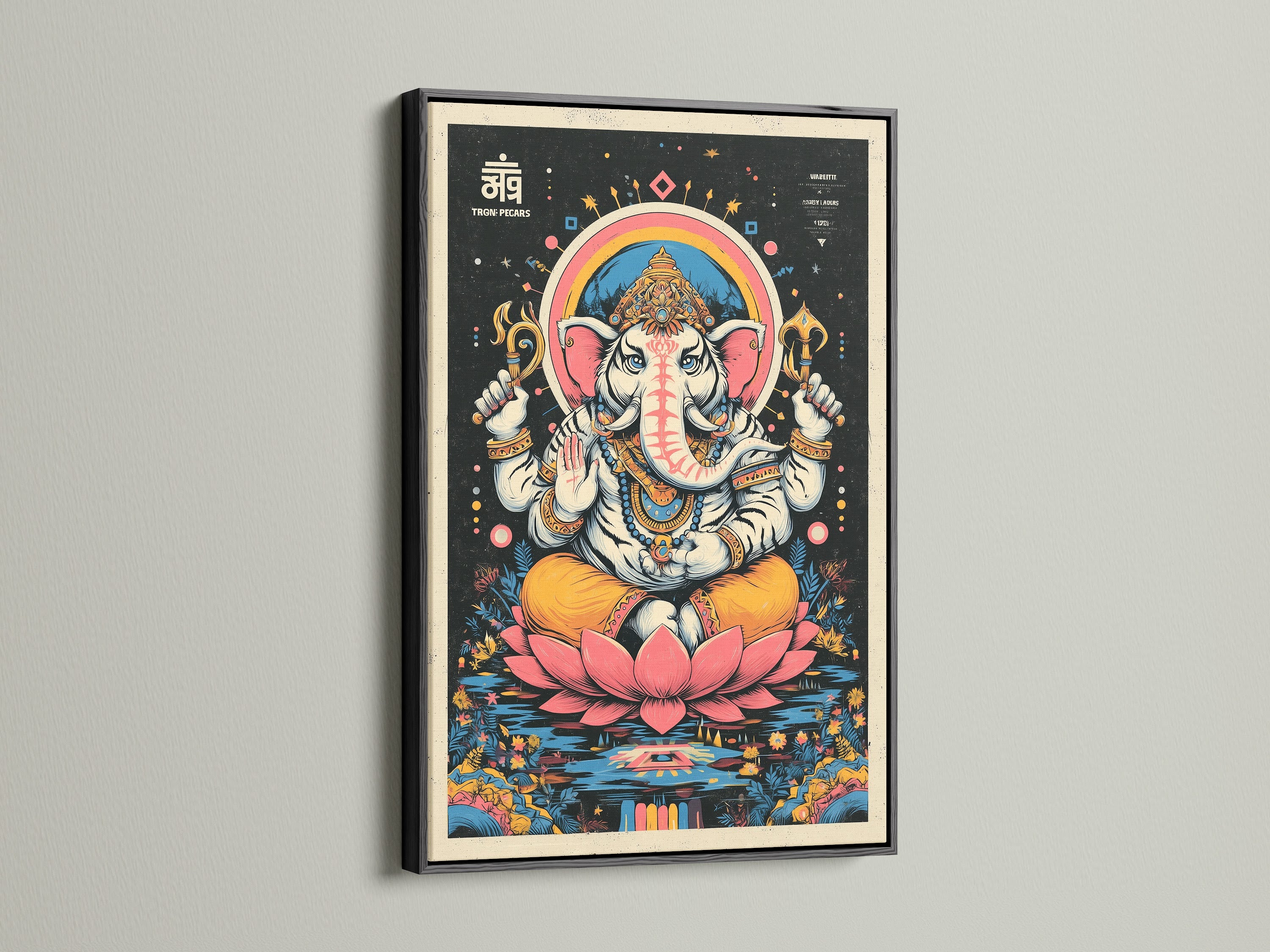 Ganesha Canvas Print in a black frame. This Hindu God wall art is perfect for spiritual meditation. Add a spiritual touch to your yoga studio decor. This elephant deity artwork is a unique piece. The artwork has vibrant pink accents.