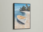 Tropical beach canvas artwork with a white boat in a black frame. This coastal wall art complements any interior. The seascape artwork offers a calming sea view. Perfect for creating a beachy atmosphere. Discover our island art and nautical decor. Bring the beach home.