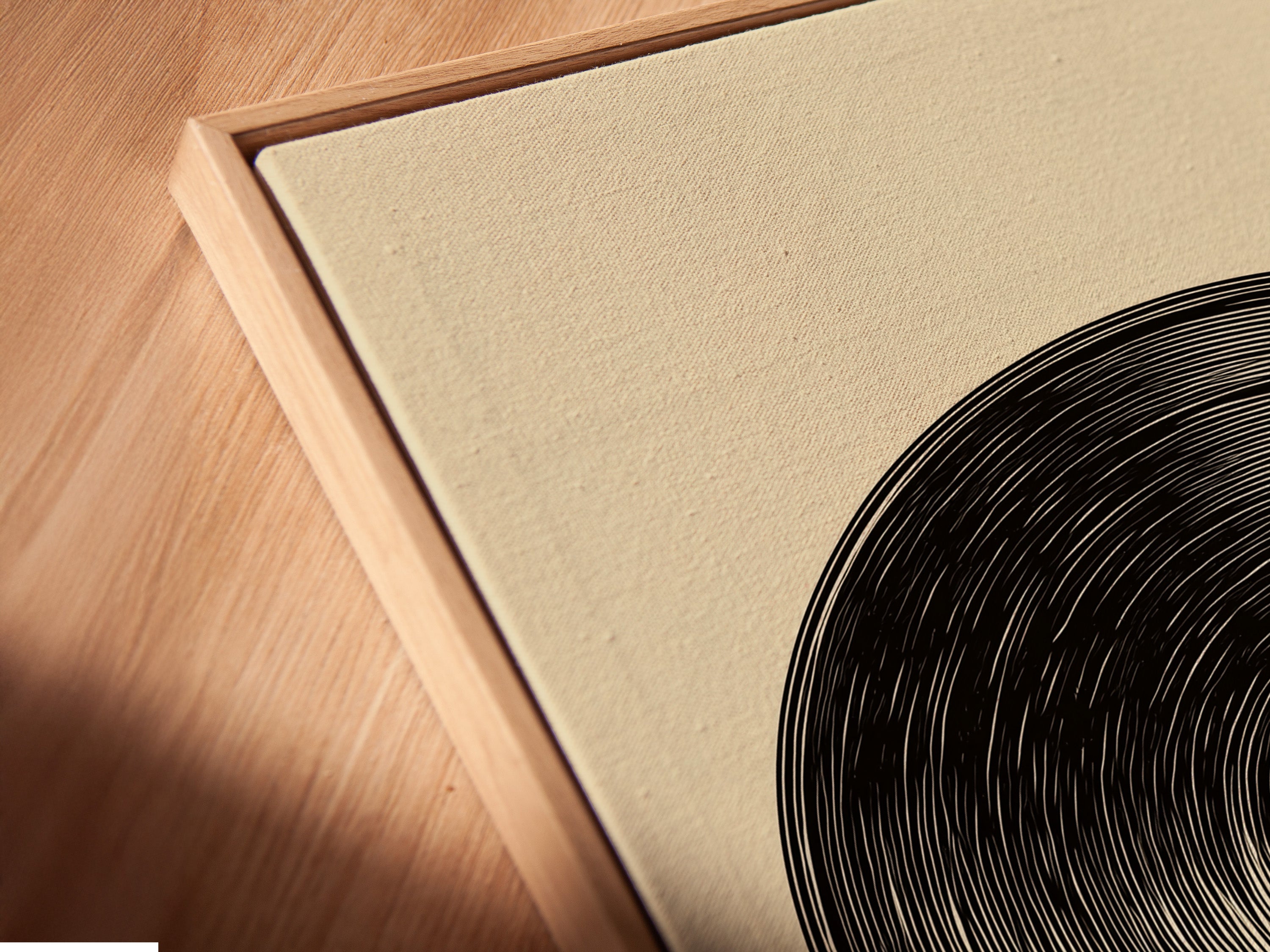 A canvas print is showcased in a floating frame. The angled close-up highlights the frame's unique style. The floating frame adds a modern touch. Discover the beauty of canvas prints in floating frames.