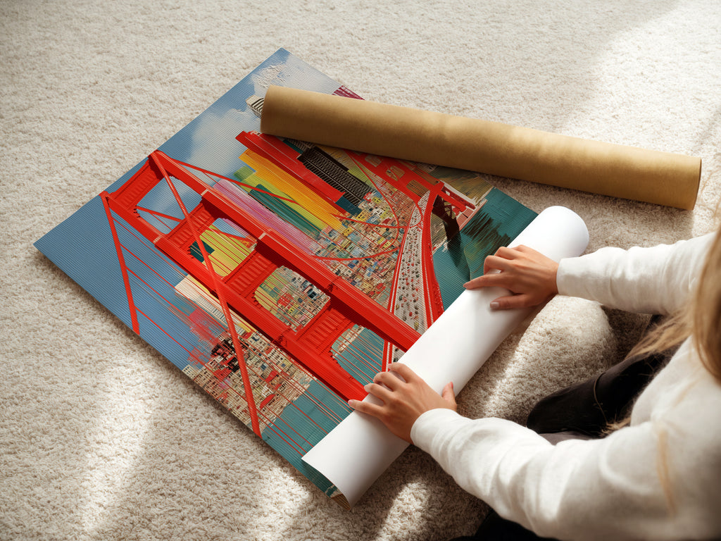 A woman carefully rolls a fine art poster paper featuring the Golden Gate Bridge. This San Francisco print is ready to become a stunning piece of wall art. The cityscape poster is perfect for adding a touch of California decor to your home or office.