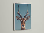 A striking Impala art print is showcased. It is framed in a clean white frame. The white frame offers a modern touch. This frame makes the artwork pop against the wall.