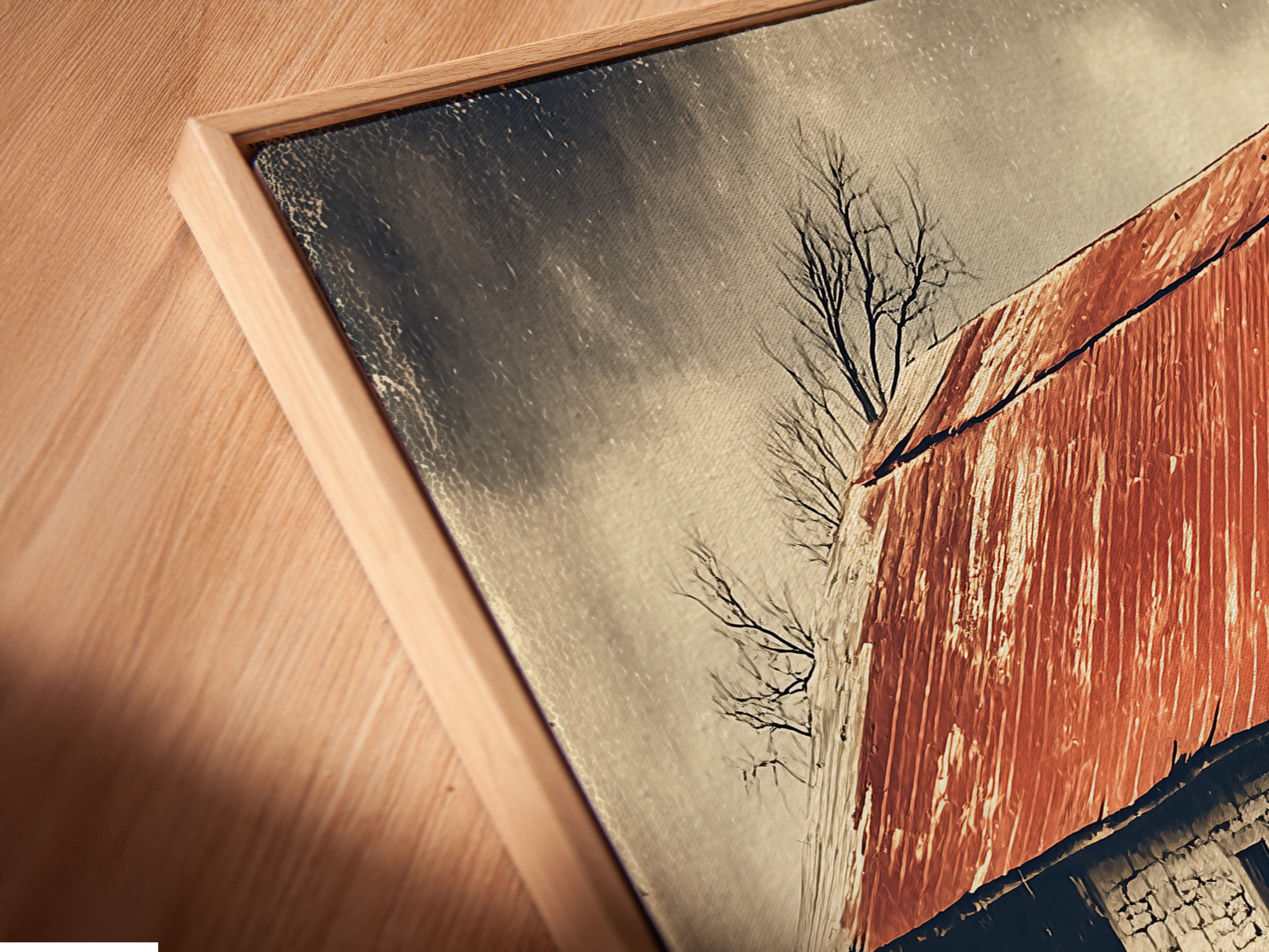 Close-up of a canvas print in a floating frame. The artwork showcases a vintage red barn and sheep art. Perfect farmhouse decor for any home. Find rustic wall art that elevates your space. Explore our country art print options today.