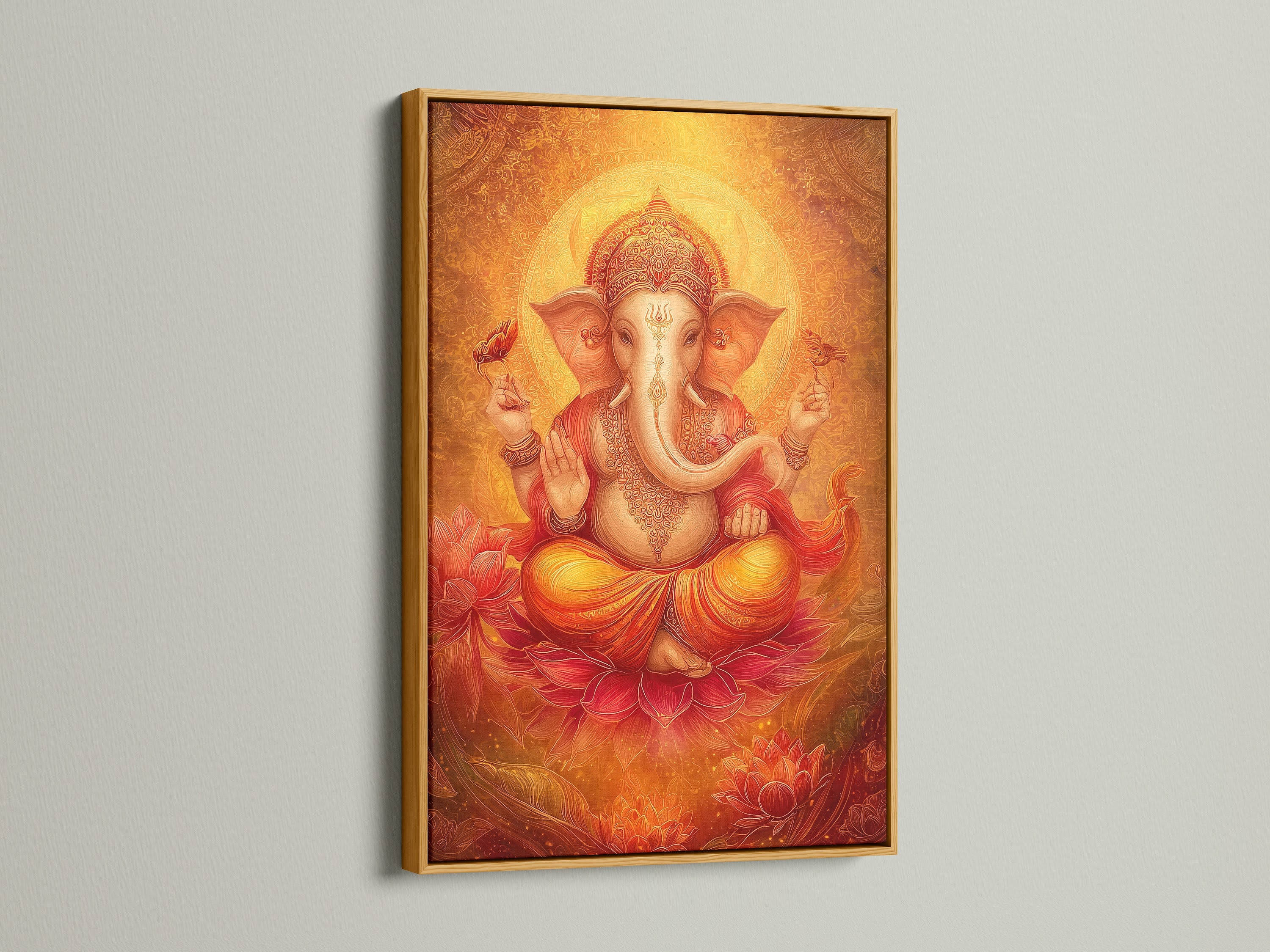 Ganesha Canvas Art in a gold frame. The Hindu God is shown in golden orange spiritual art. This artwork is ideal for meditation room decor. It also enhances yoga studios. The art complements bohemian eclectic and modern styles.