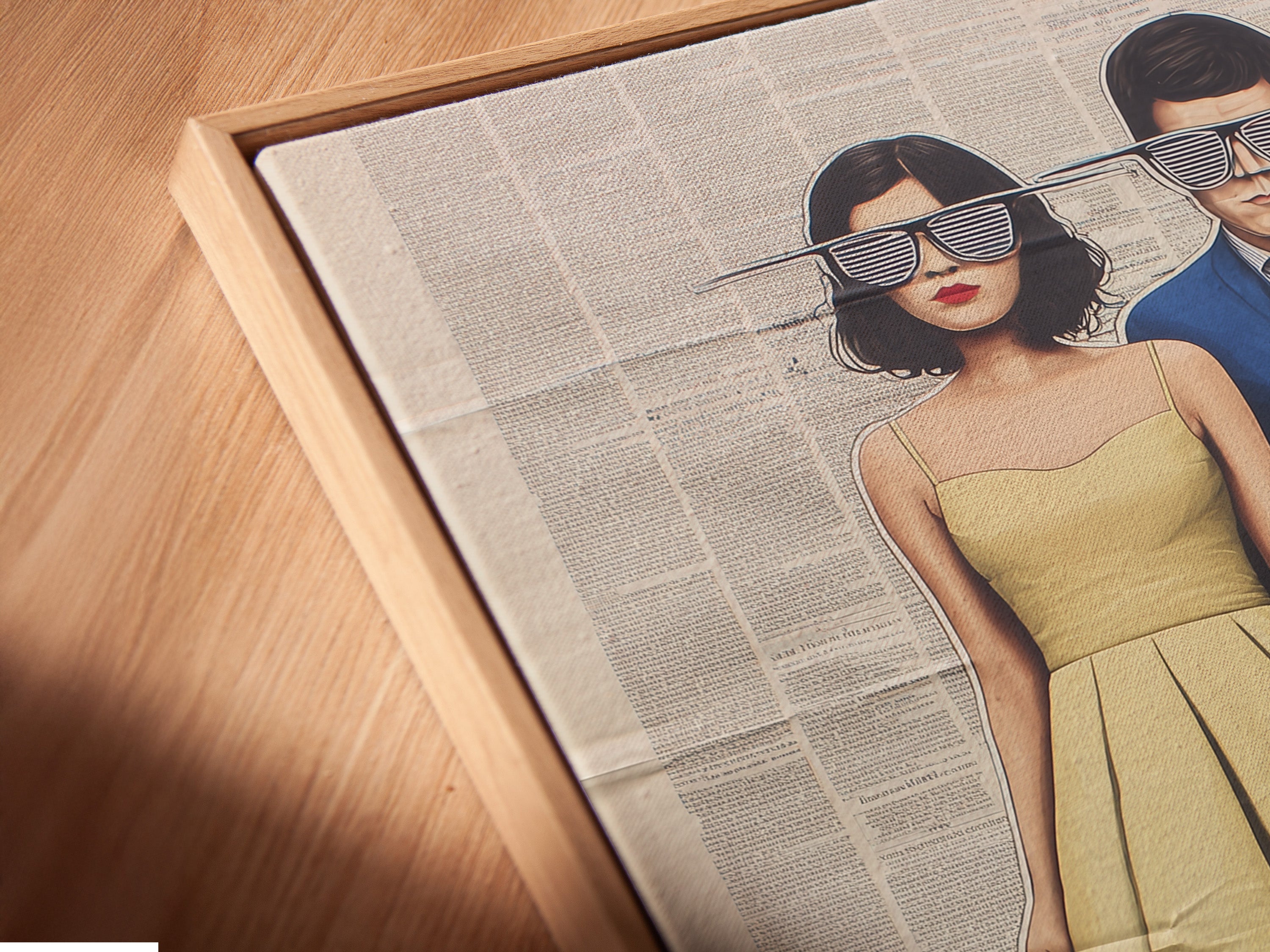 Close-up angled canvas in floating frame.