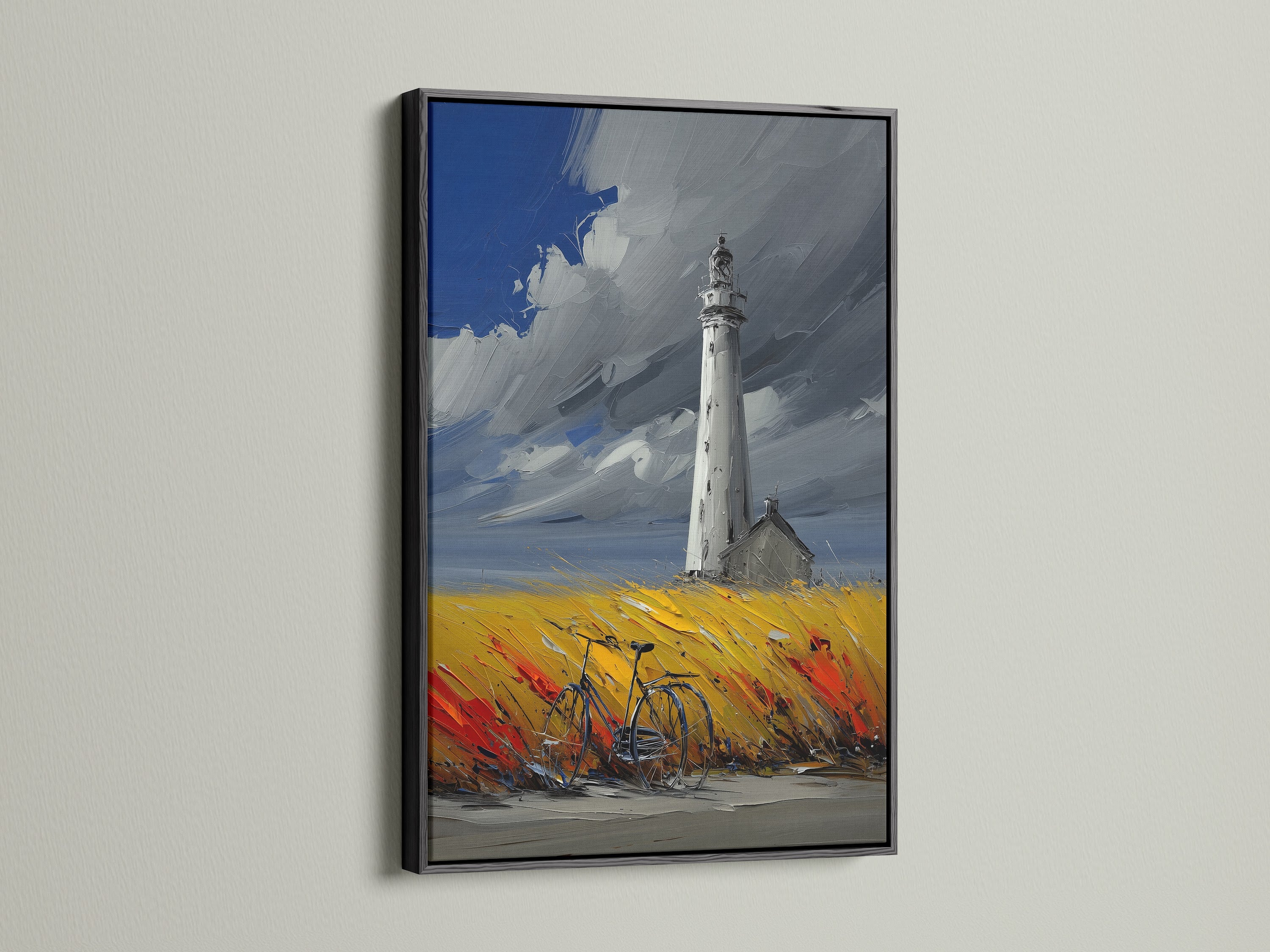 Lighthouse coastal artwork with a black frame.  This ocean wall art is a stunning addition to any space.  Consider this piece for office wall art or a seaside cafe. The painting includes a bicycle in a colorful field. The lighthouse stands tall against a cloudy sky. The artwork makes a bold statement.