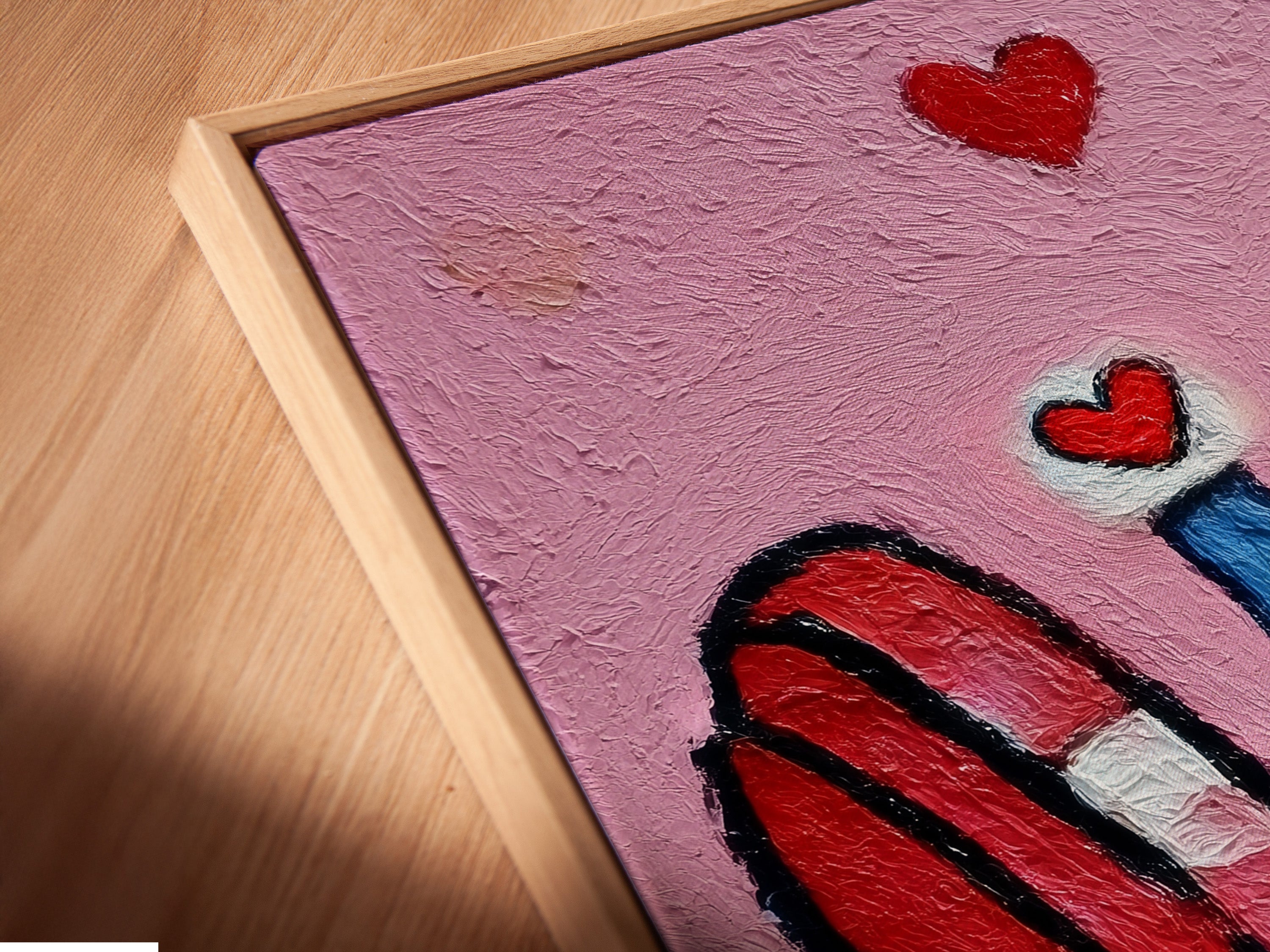 Close-up angled view of a canvas print in a floating frame. The dumbbell artwork is a pink gym canvas print. This fitness motivation wall art is ideal for workout decor. The floating frame enhances its contemporary style. Perfect for a home gym.