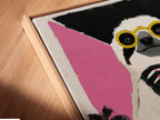 Close-up angled view of the canvas print in a floating frame. The Sloth Cocktail artwork is a fun tropical animal art piece. The floating frame gives a modern gallery-like look. It is perfect for any space.