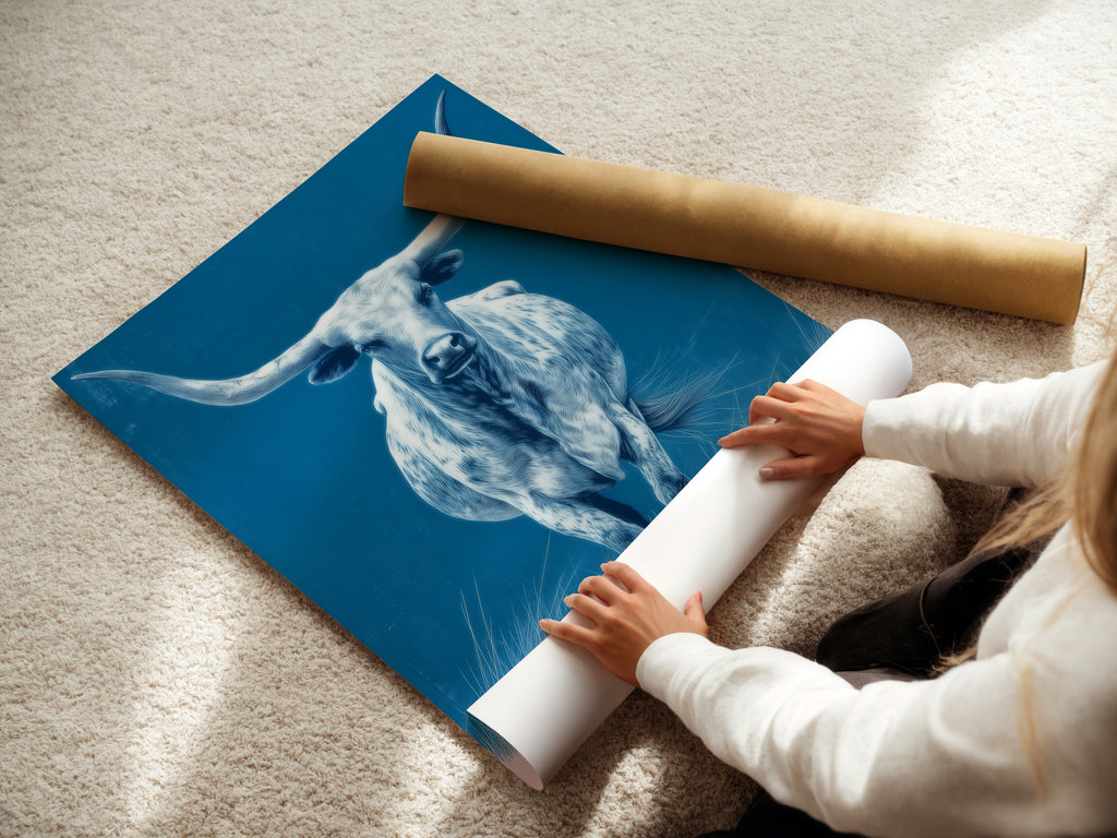 A woman is carefully rolling a fine art poster paper. This showcases the delicate handling of the longhorn bull artwork. The fine art poster paper ensures high quality prints. Perfect for art collectors and enthusiasts.