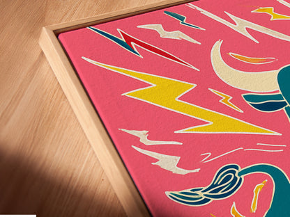 Close-up of a canvas print in a floating frame. The bull artwork features a colorful animal. It's a pop art print style. The floating frame enhances the artwork. Add this statement piece to your home decor today.