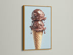 A gold frame accentuates a chocolate ice cream cone artwork. The artwork is displayed on a white wall. The gold frame brings a touch of luxury and elegance. This frame enhances the artwork's appeal. Elevate your home decor with this stunning piece.