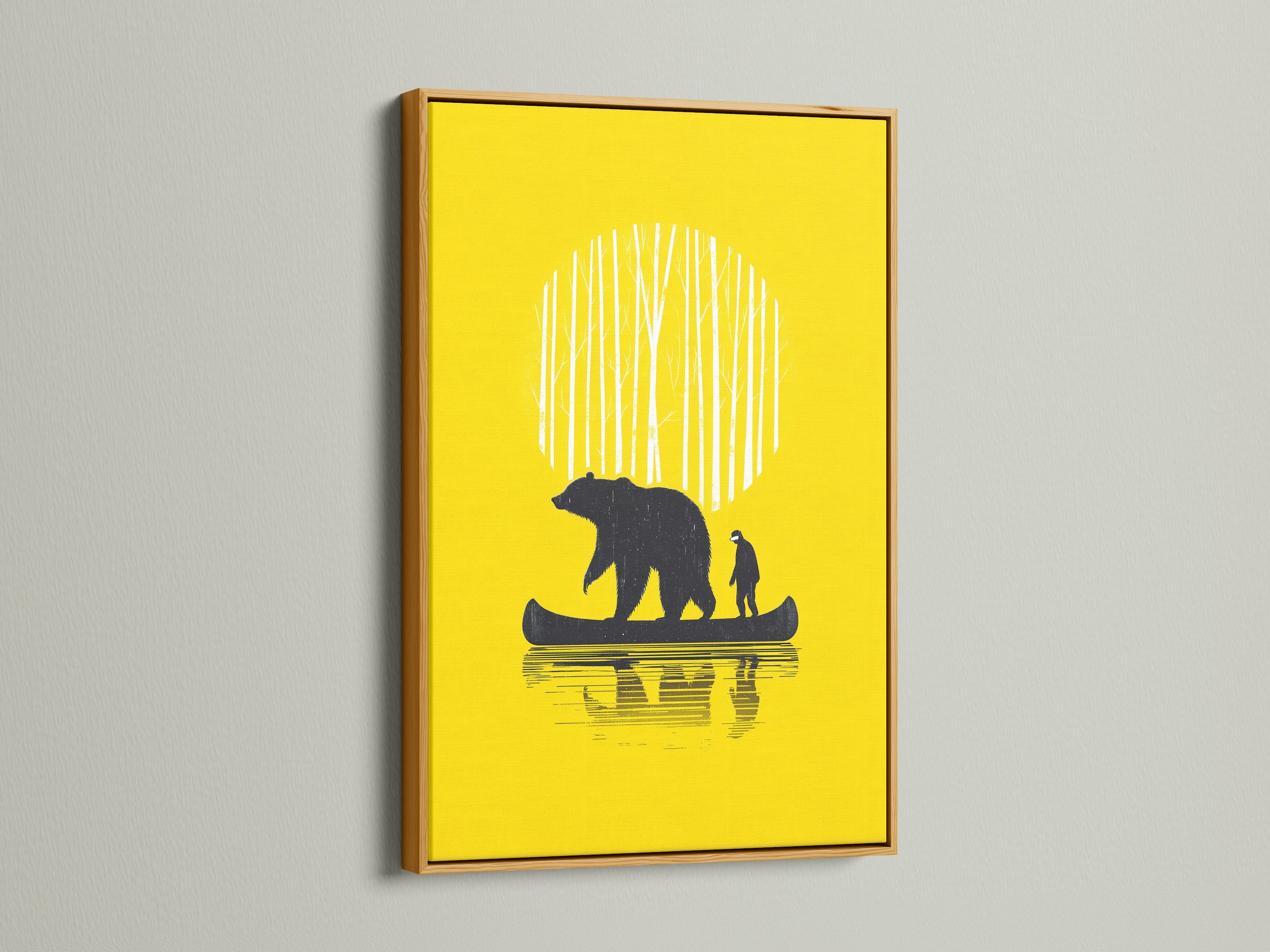 Bear Canoe artwork framed in a gold frame. The art features a bear and man in a canoe. The gold frame adds a touch of luxury to your yellow wall art. This artwork is great for nature artwork or a gift for men.