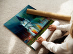 A woman carefully rolls a fine art poster paper of the Church at Night artwork. Ensuring the spiritual art is pristine and ready for display. This high-quality print captures the vivid colors of the impressionist piece. Perfect for adding a touch of modern elegance to any space. Explore this calming wall art.