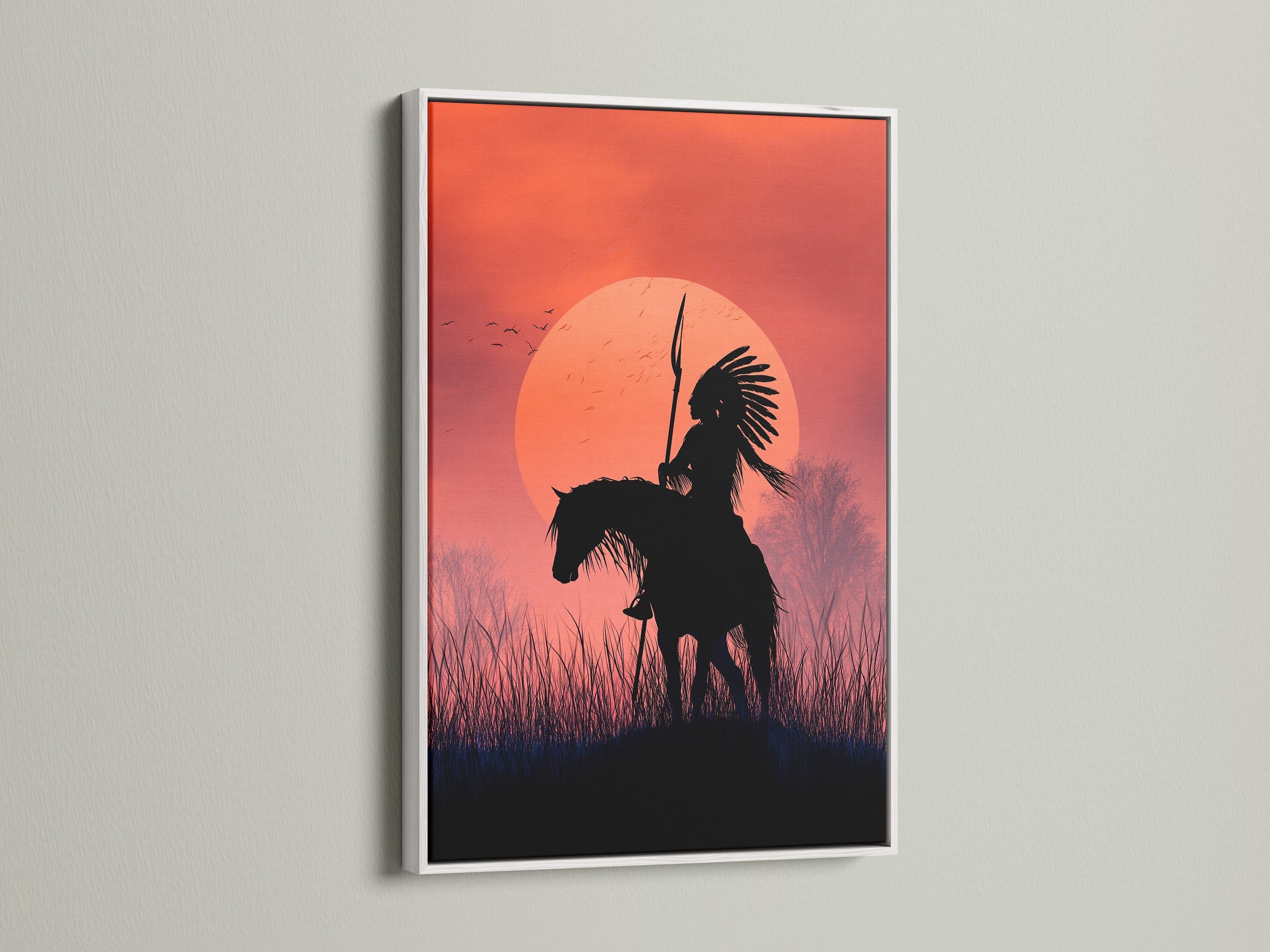 Native American Warrior artwork in a white frame. This striking sunset wall art showcases a horseback rider silhouette. Elevate your space with this tribal wall art. Perfect as southwestern decor or a unique native art print.