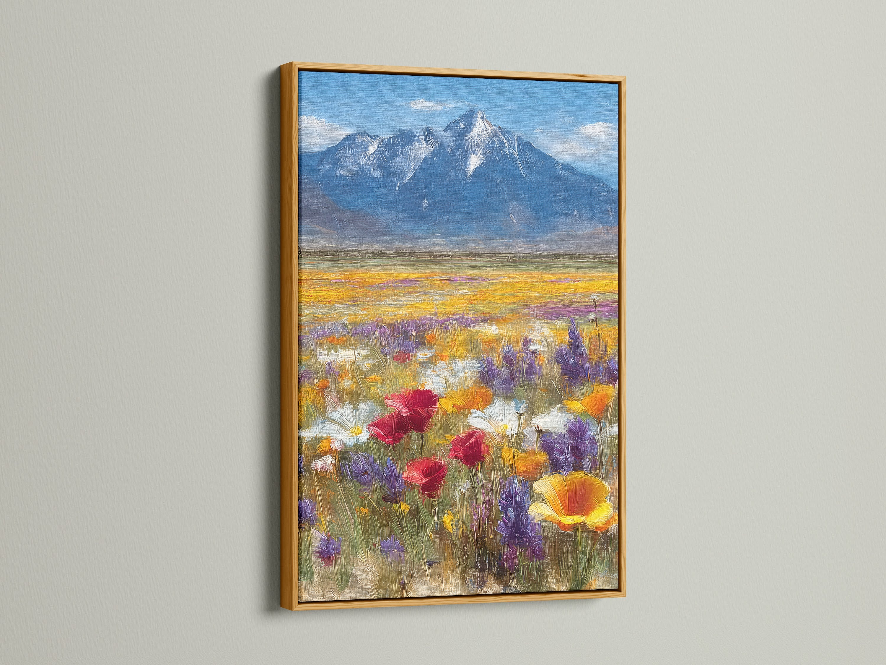 Wildflower art print in a gold frame. This mountain landscape artwork brings elegance and warmth to your space. The gold frame accentuates the colorful poppy field. Perfect for adding a touch of luxury to your living room or office. Discover our range of vibrant wall art to elevate your decor.