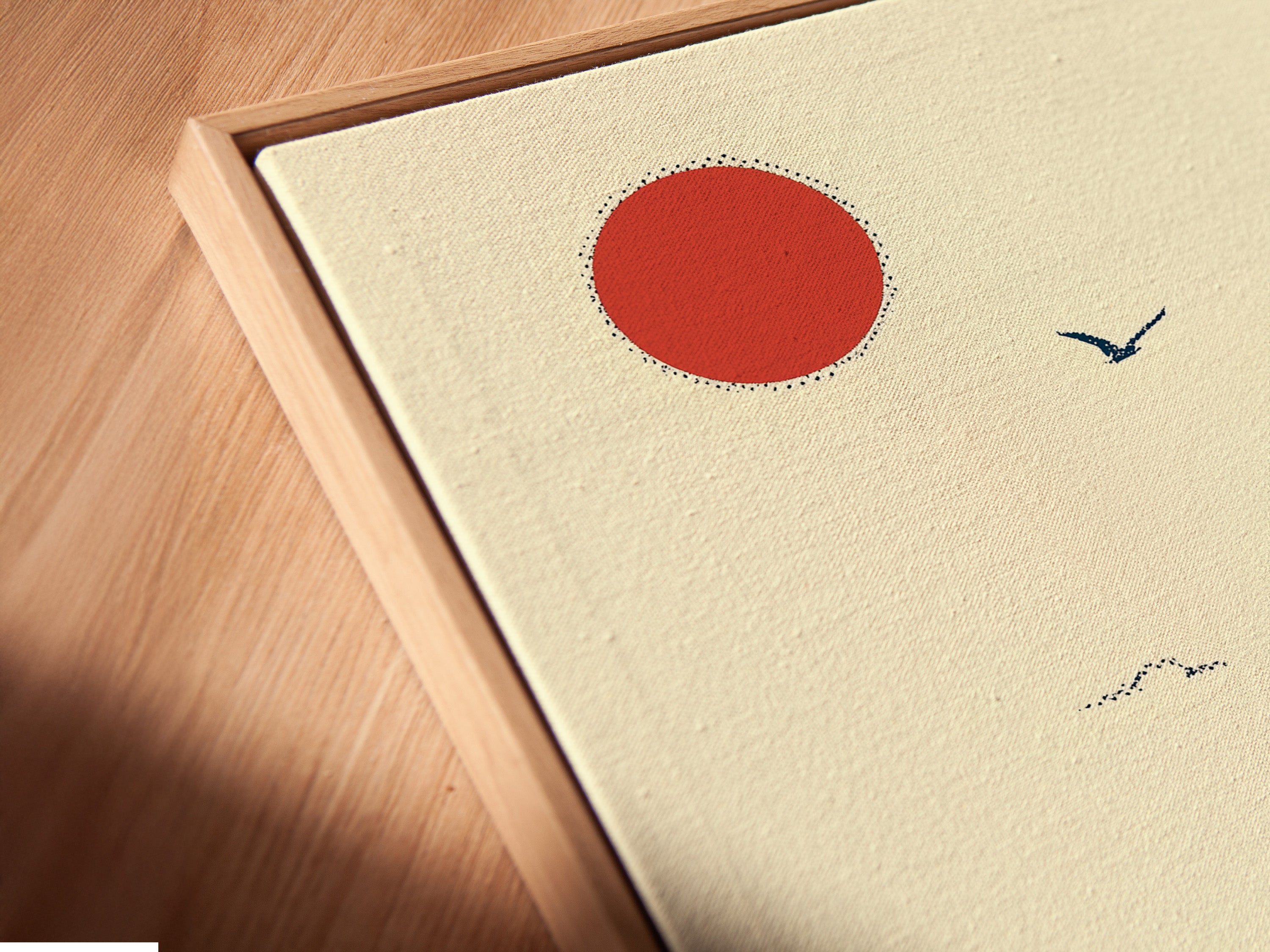 Angled close-up of a canvas print in a floating frame. Showcasing the depth and texture of the Japanese bird artwork. The floating frame enhances the contemporary style.