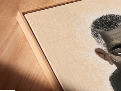 A close-up of a canvas print is displayed in a floating frame. The artwork is a modern minimalist portrait. It is ideal for adding a refined touch to your space. Consider it for living room art.