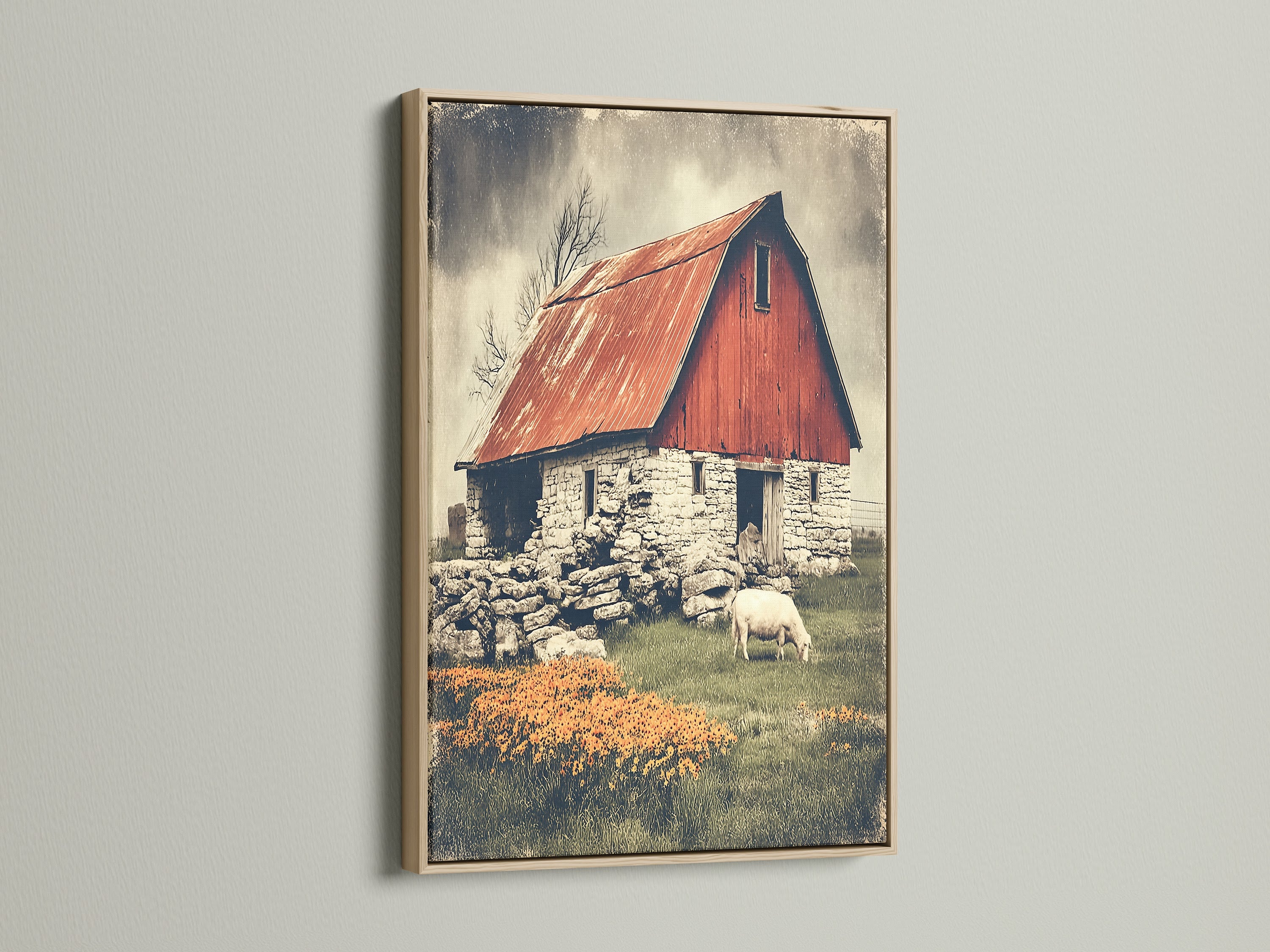 Rustic barn canvas print with an oak frame.  The artwork features a vintage red barn and sheep art. Elevate your farmhouse decor with our selection of country art prints. Enhance your dining room art with a touch of rustic charm.