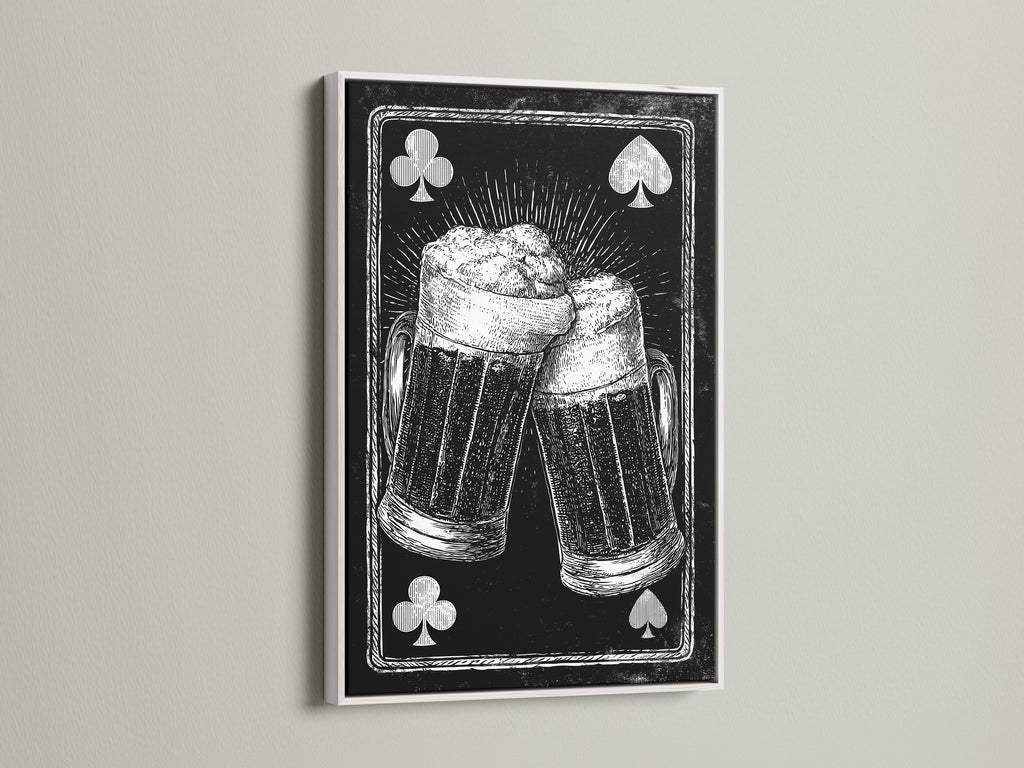 Framed artwork featuring a playing card beer mug art print. The artwork is framed in a white frame. The white frame offers a clean modern look. It will brighten up any room. A perfect gift for a beer lover.