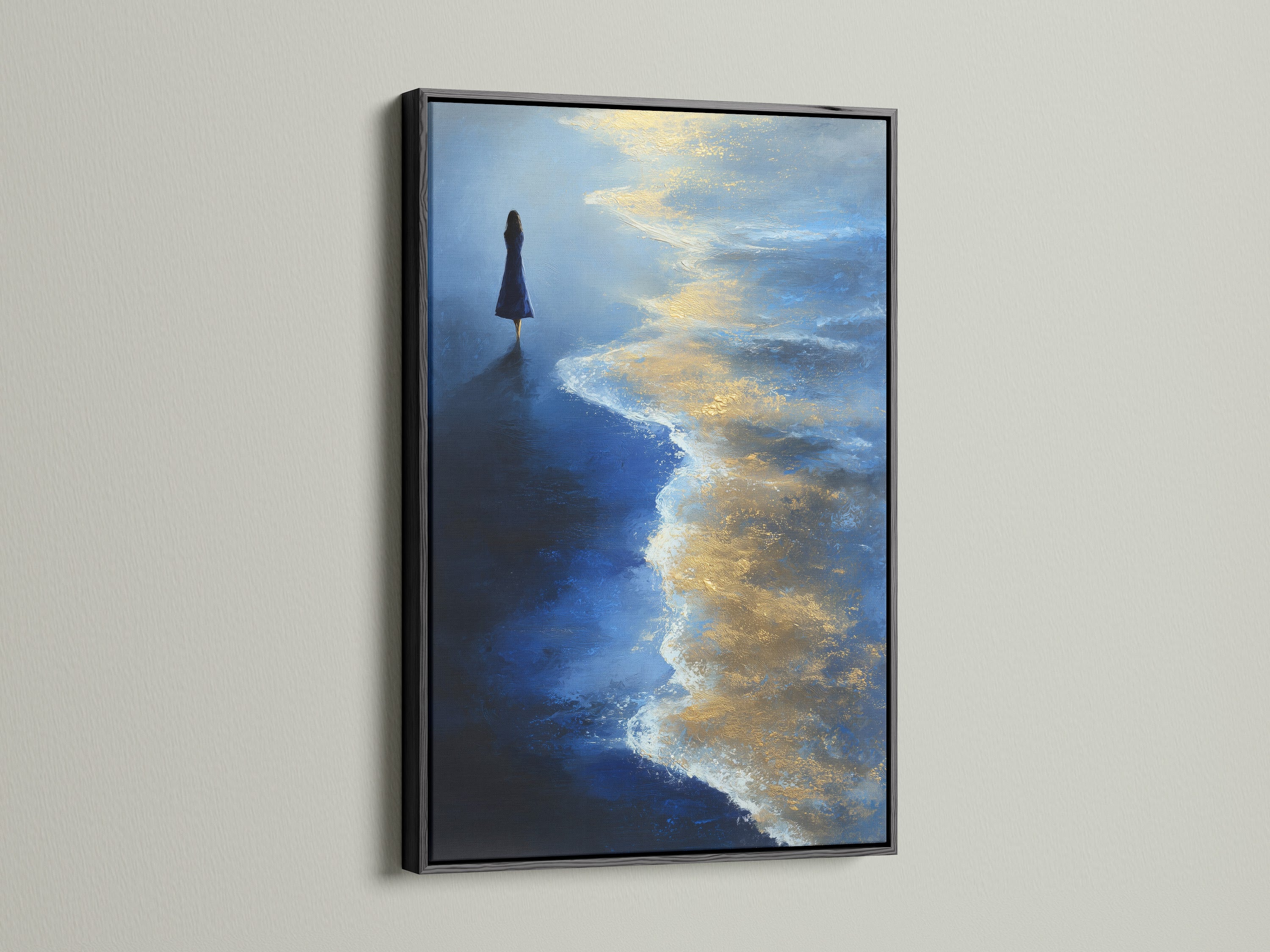 Ocean Solitude artwork with a black frame. This piece brings a touch of modern artwork to any space. The figure painting adds depth and contemplation. This artwork enhances minimalist decor.