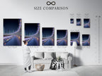 A size comparison chart is displayed in an interior setting next to the futuristic cityscape artwork. The modern urban wall art features digital city lights. This chart helps you visualize the different sizes available. Find the perfect fit for your living room bedroom or office.