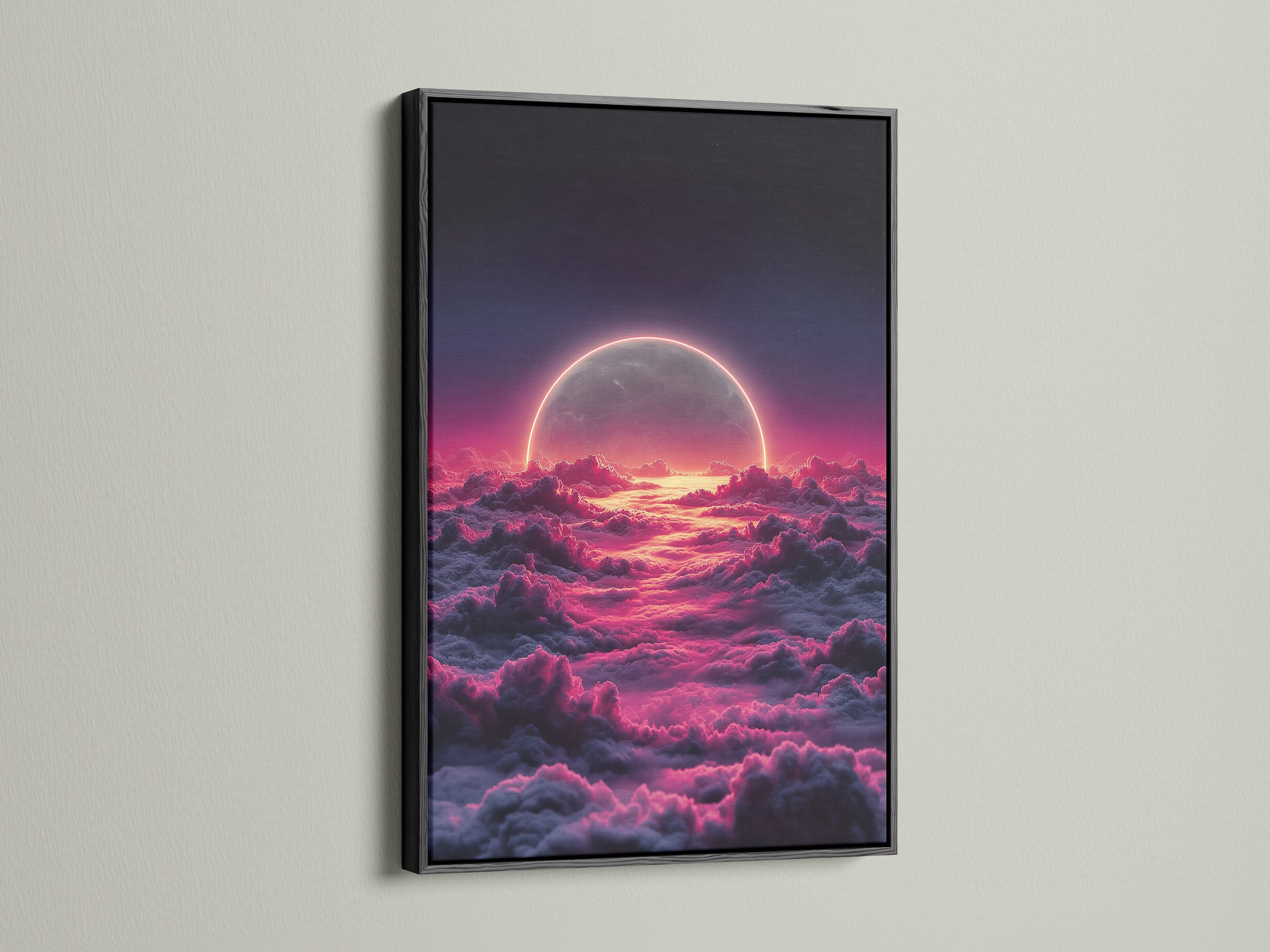 The celestial moon artwork is presented in a black frame. Pink and purple hues create a dreamy aesthetic. Ideal for modern bedroom decor. The moon canvas is a cosmic focal point. Add depth and style with this space-themed art.
