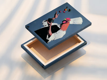 Rooster Chef art showcased as a stretched canvas print. The stretched canvas provides a gallery-quality look. It is ready to hang in your kitchen or dining room. Enjoy this quirky animal art with a contemporary touch. See the details of our stretched canvas prints.