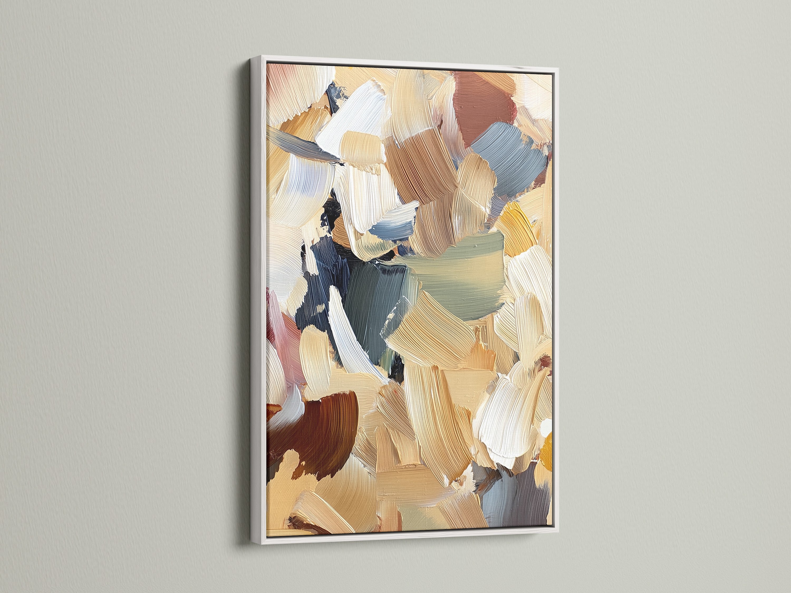 Abstract artwork in a white frame. The artwork includes brushstrokes of beige brown blue and green. The frame is a clean white. Add a touch of elegance with white framed art. Shop our collection of framed art prints.